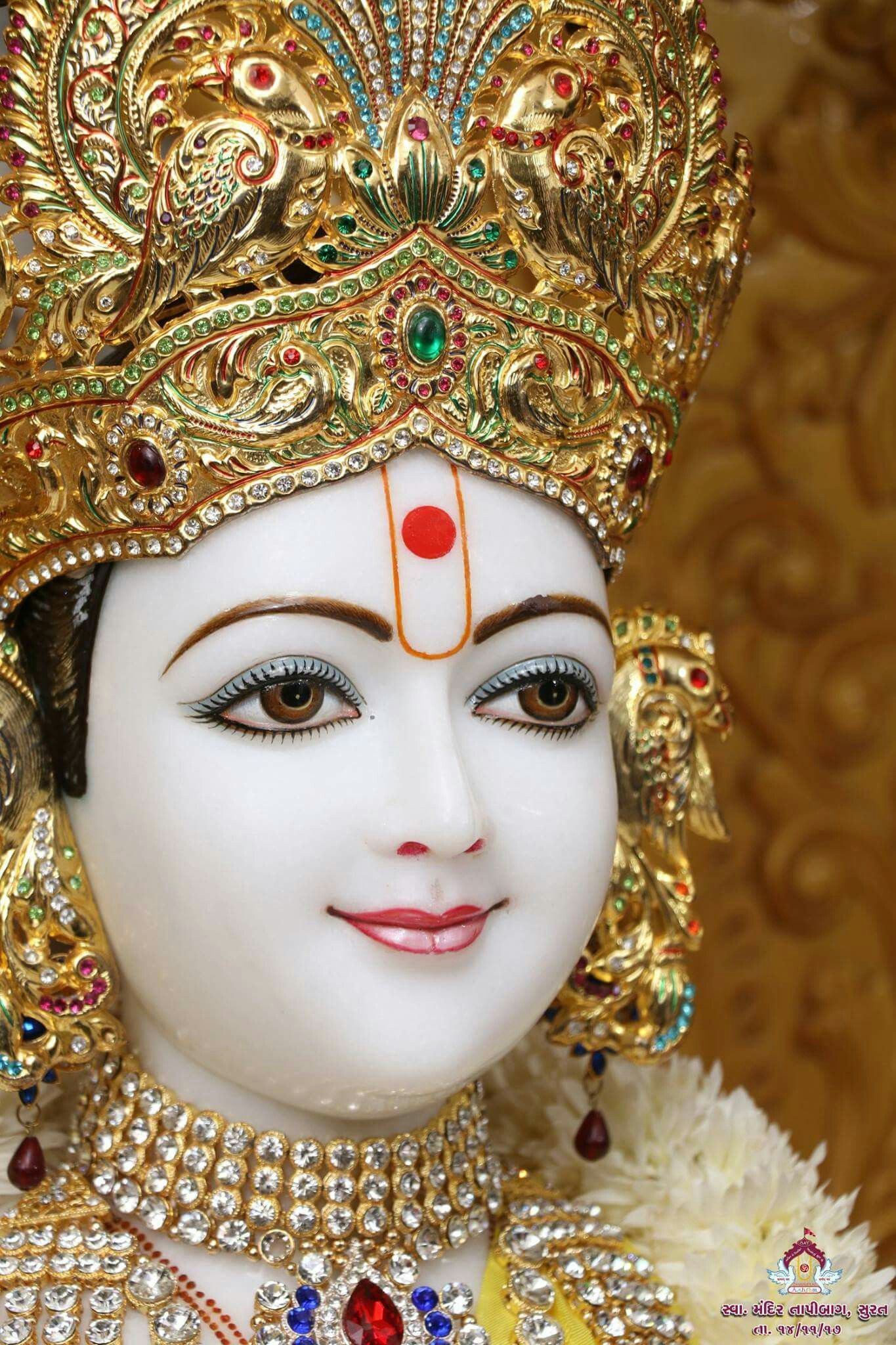 Swaminarayan with ornate golden crown