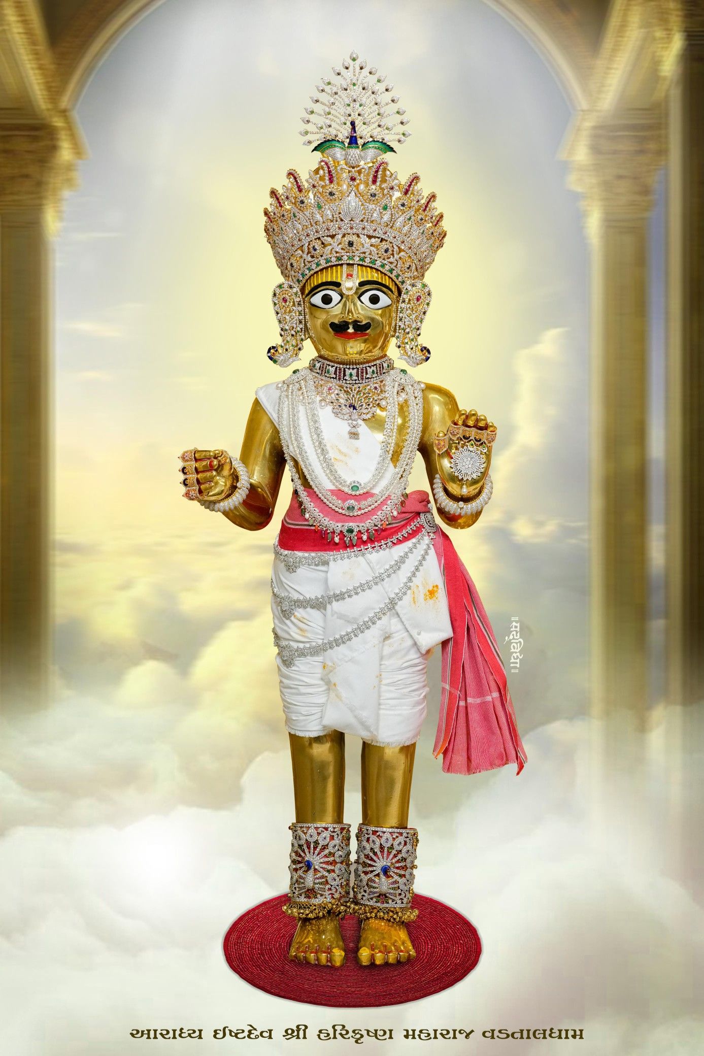 Golden Swaminarayan idol with ornate crown