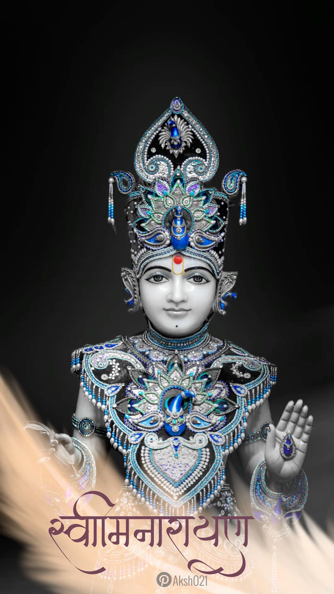 Swaminarayan in ornate divine attire