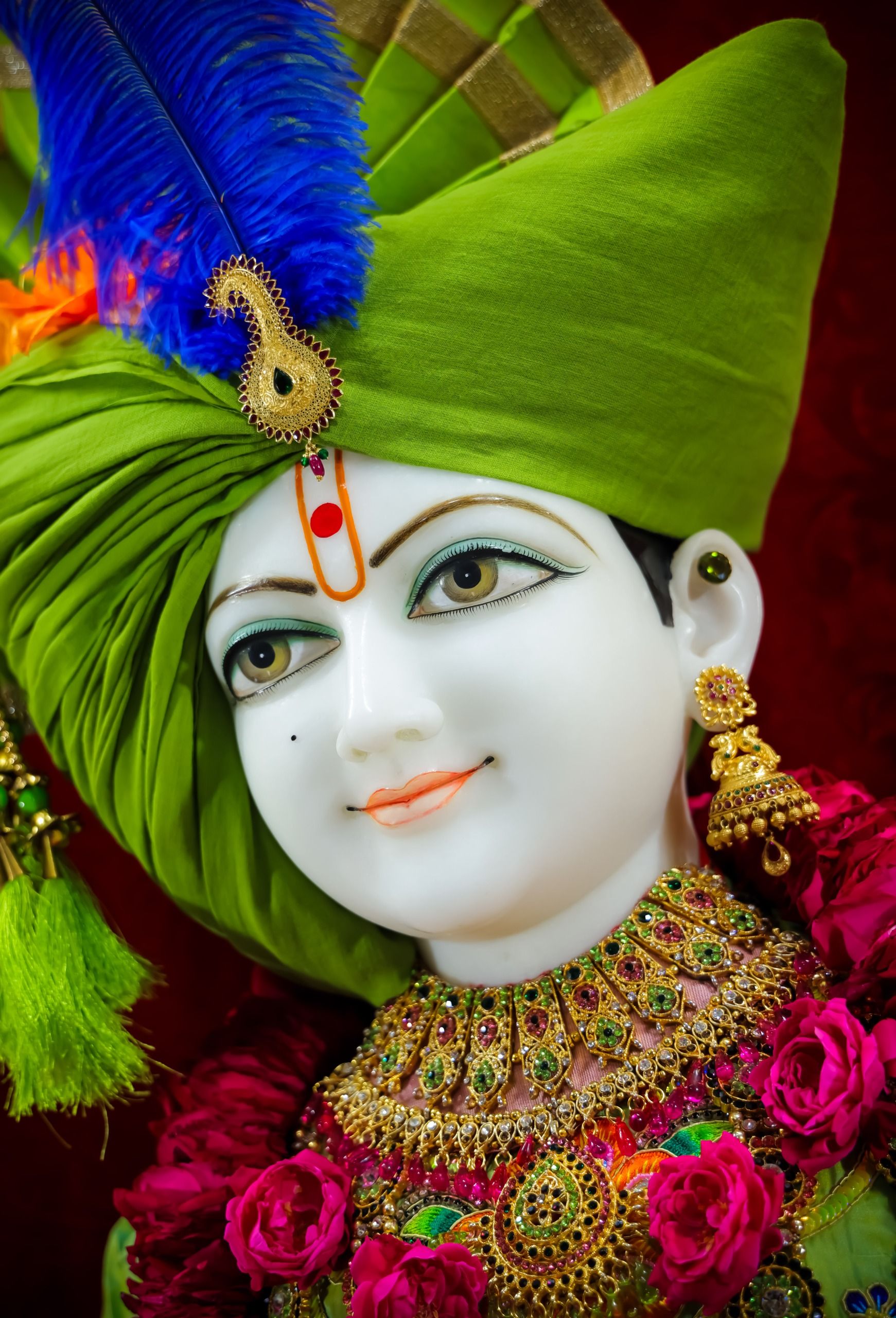 Swaminarayan Bhagwan with floral garland