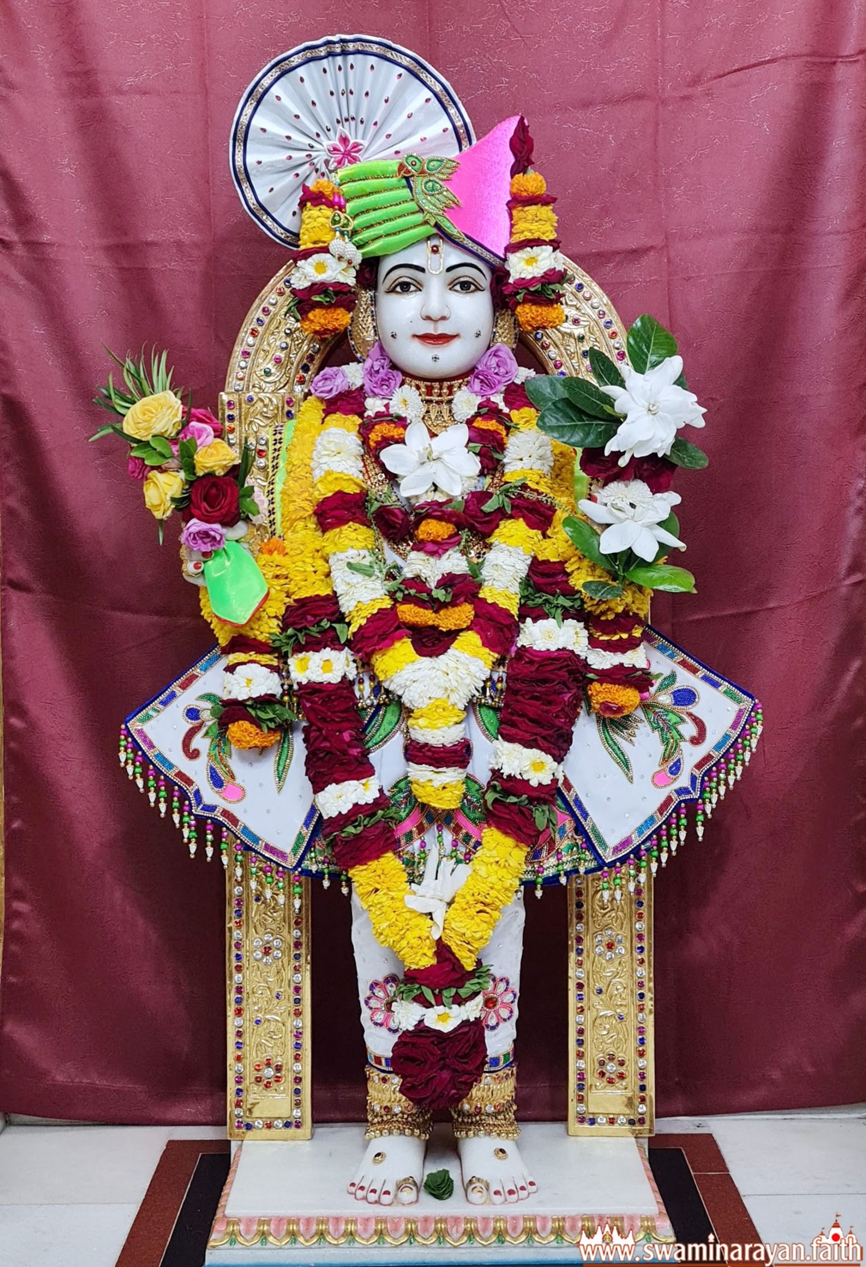 Swaminarayan Bhagwan with flower garlands