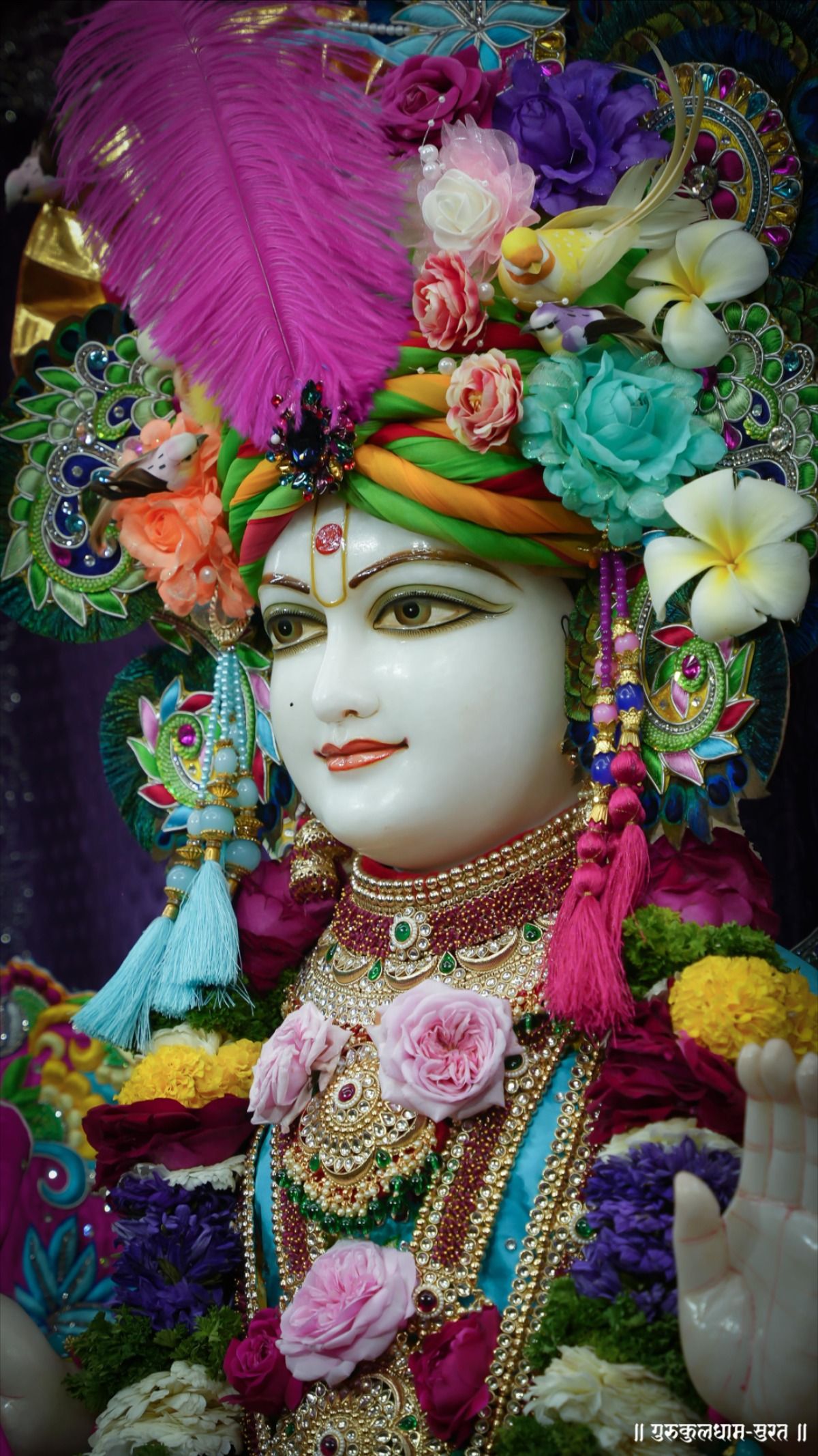 Swaminarayan with a floral crown