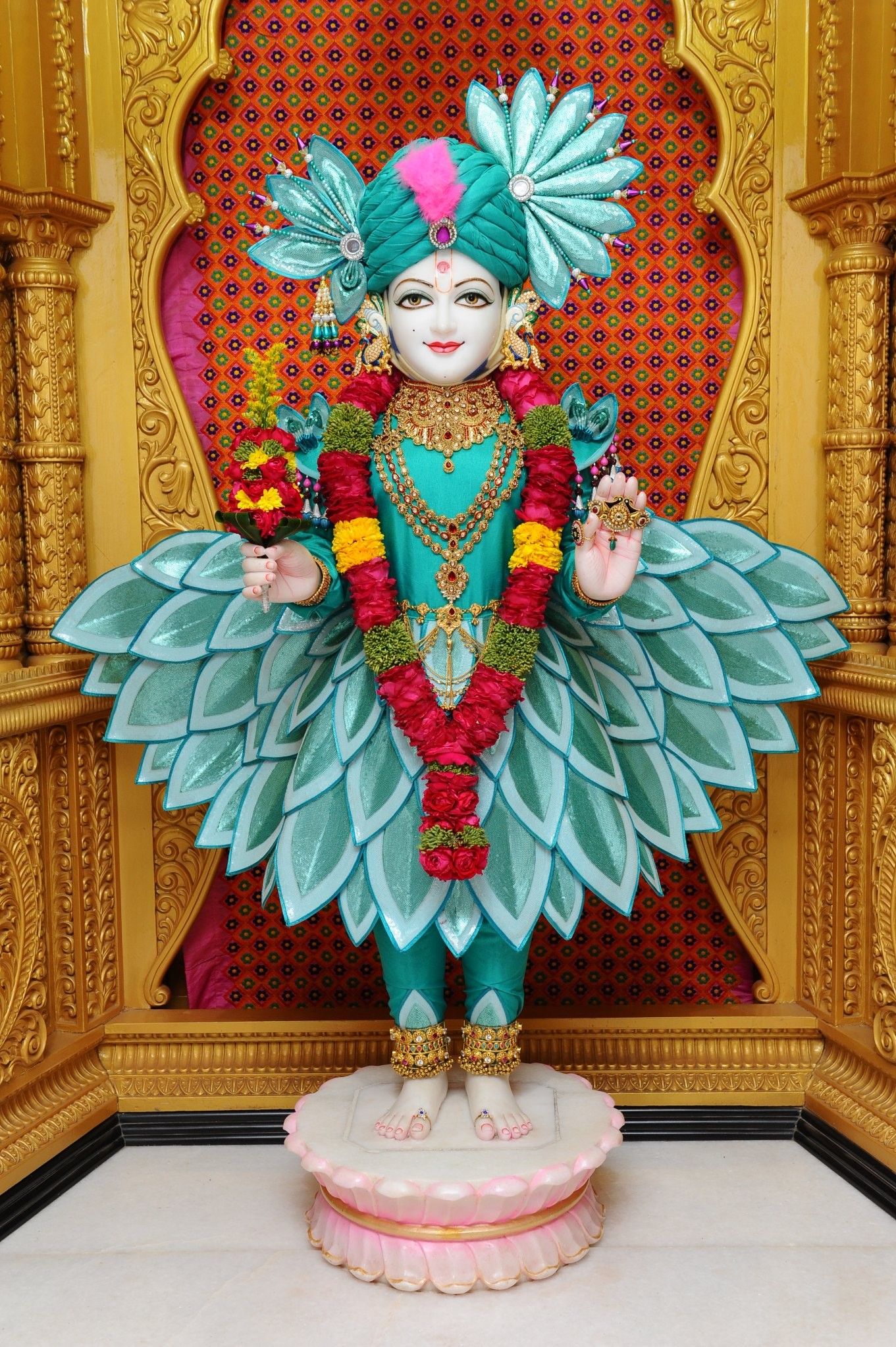 Swaminarayan Bhagwan with peacock feathers