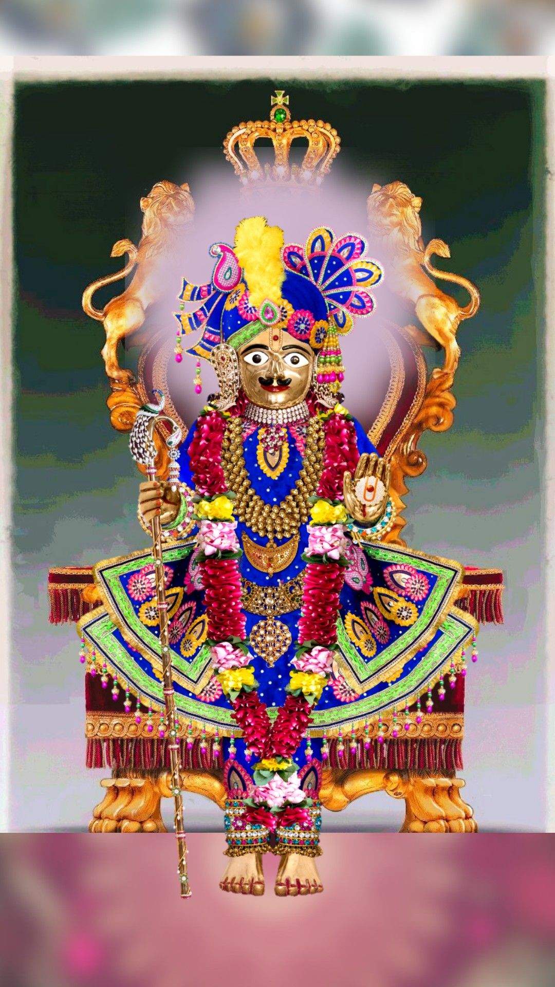 Swaminarayan deity in ornate attire.
