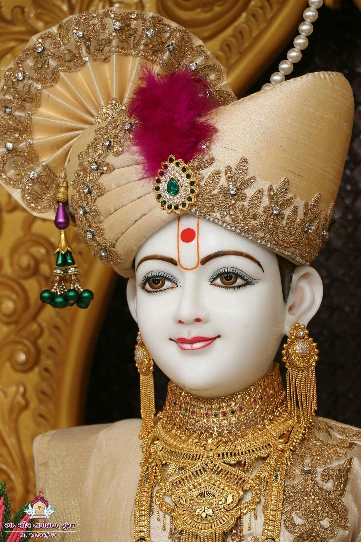 Swaminarayan with golden jewelry and turban