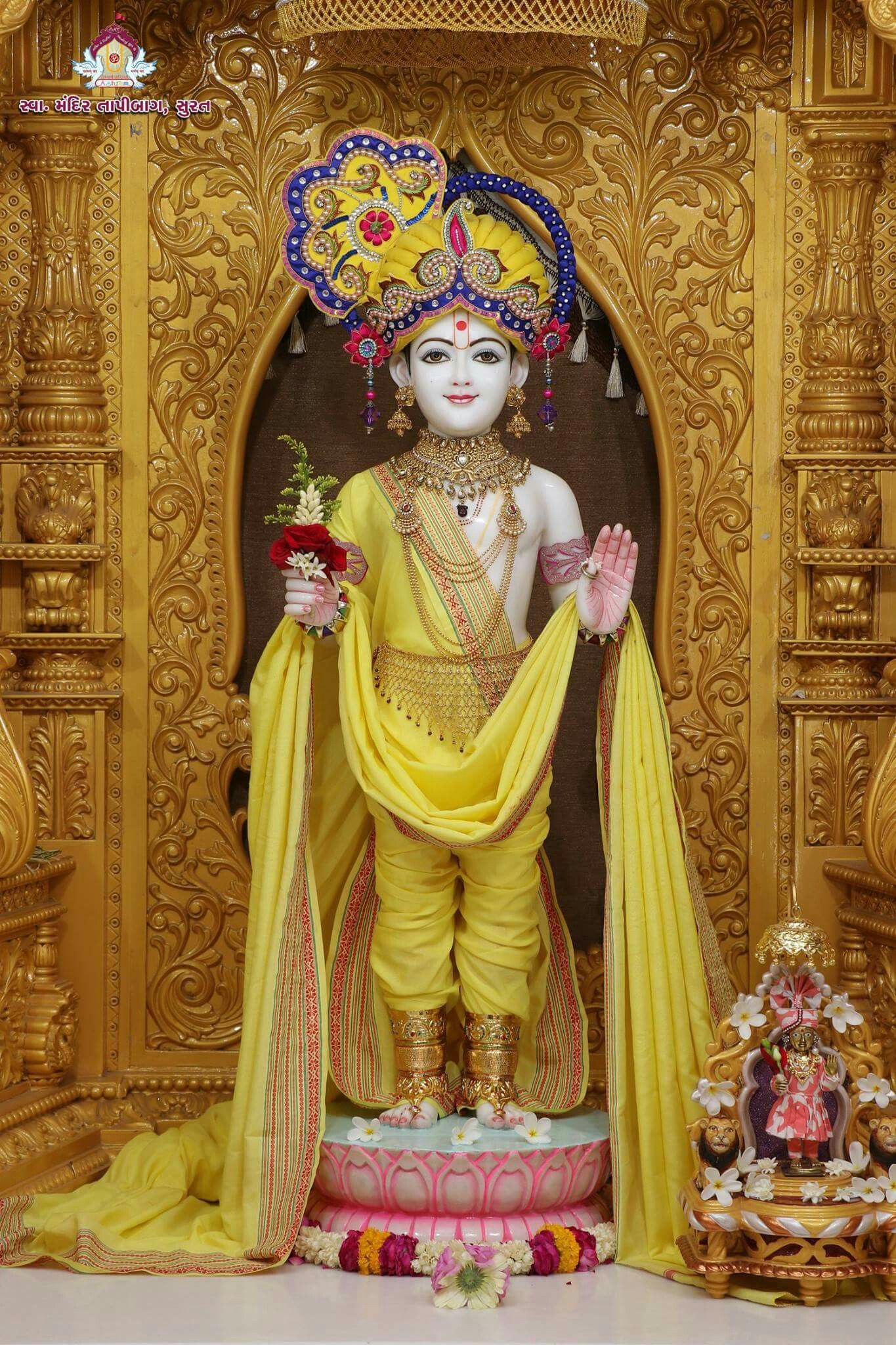 Swaminarayan Bhagwan in ornate golden attire
