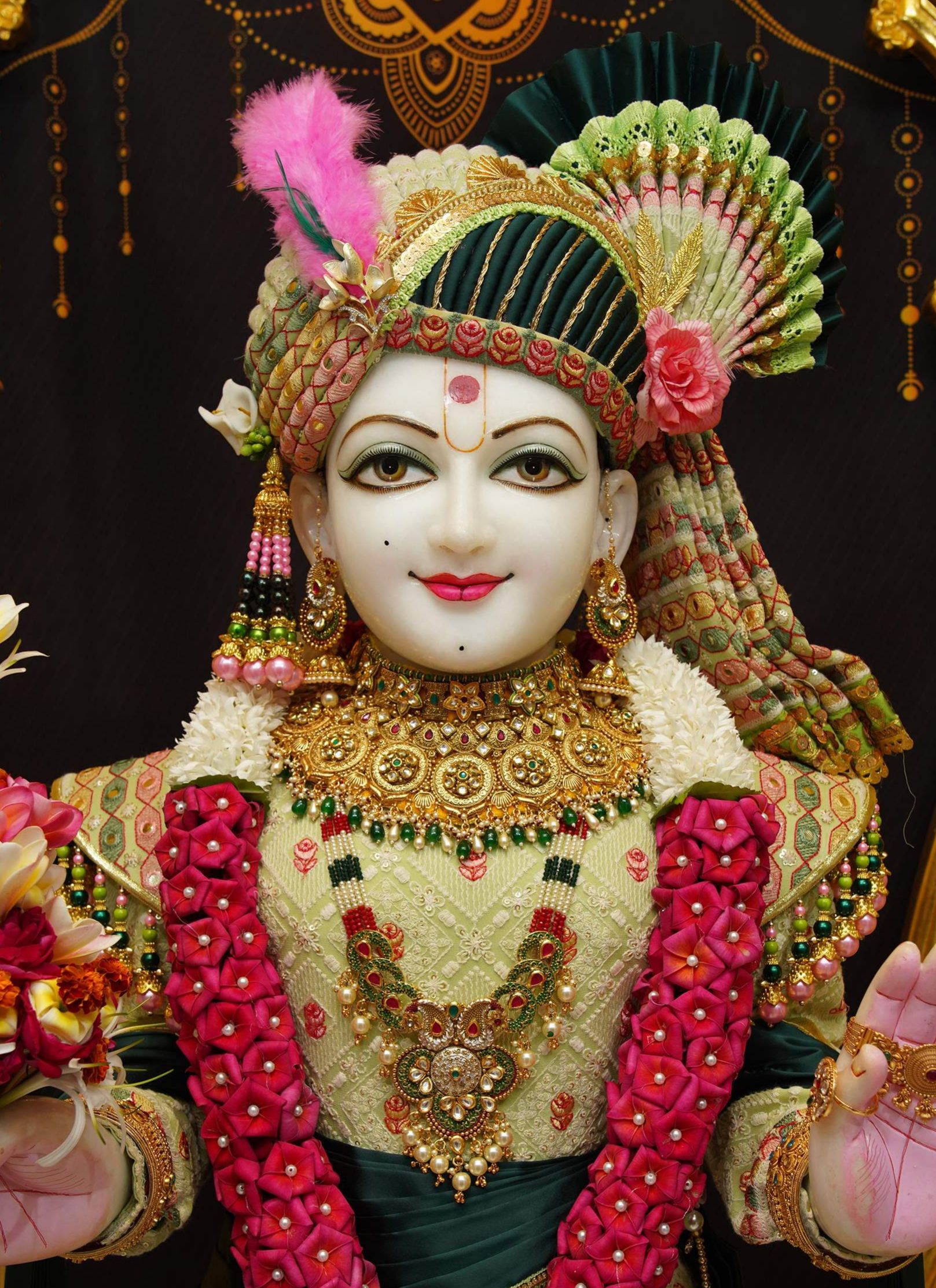 Swaminarayan Bhagwan adorned with floral jewelry