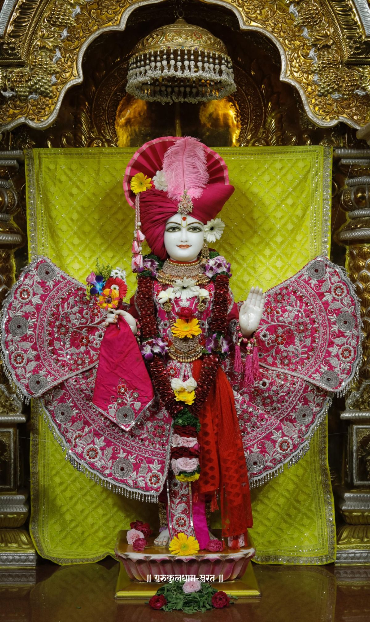 Swaminarayan deity adorned in regal attire