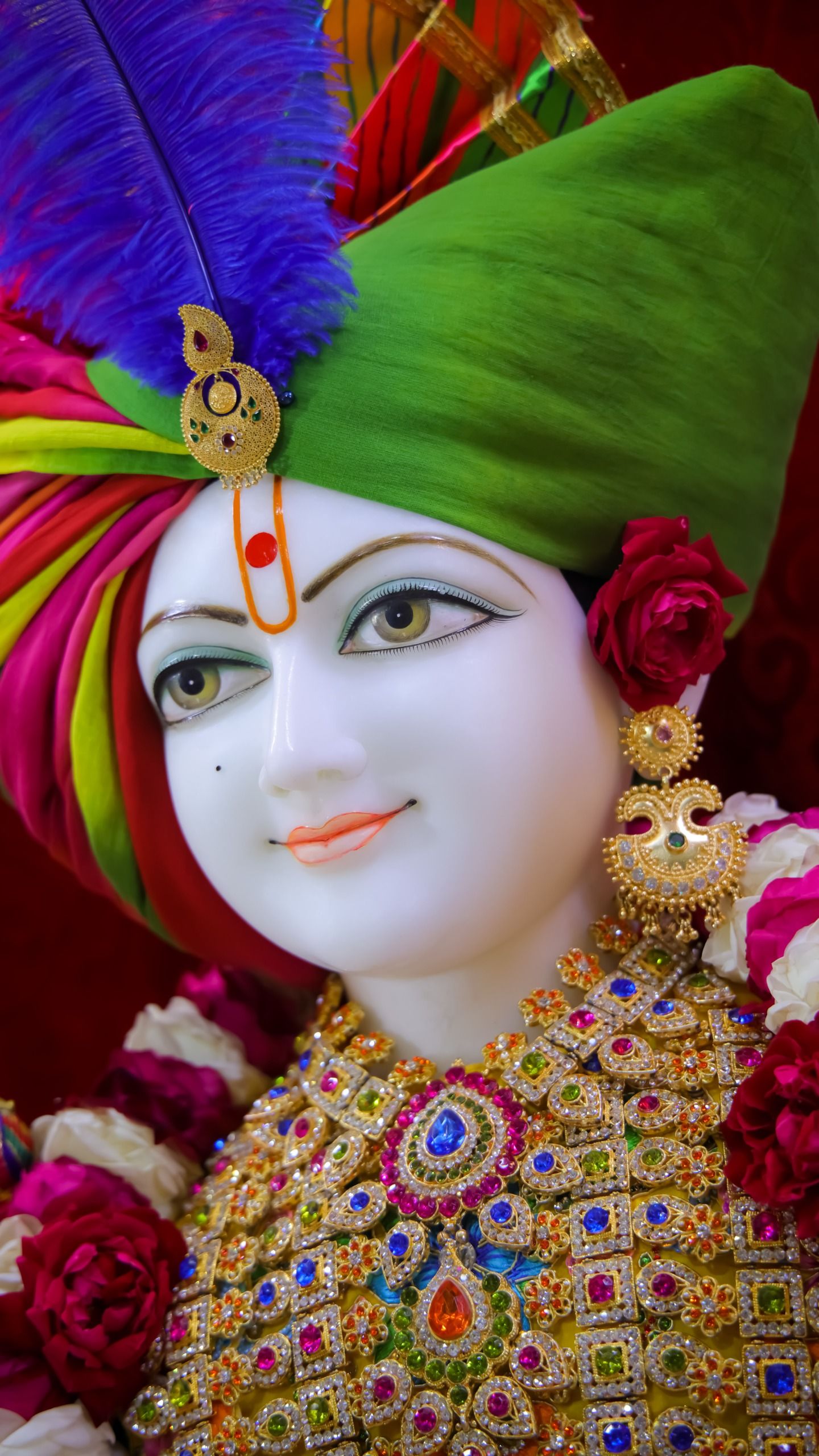 Swaminarayan deity adorned with flowers