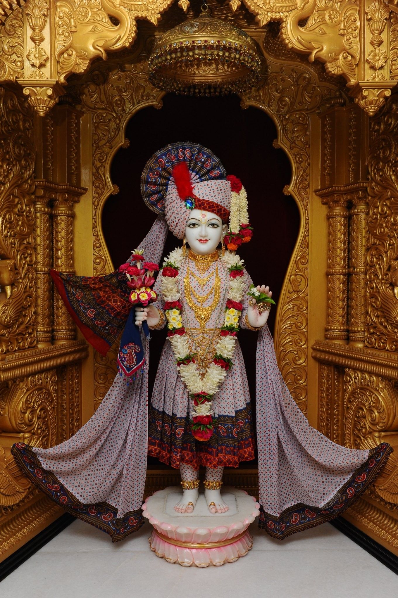 Swaminarayan Bhagwan in ornate temple setting