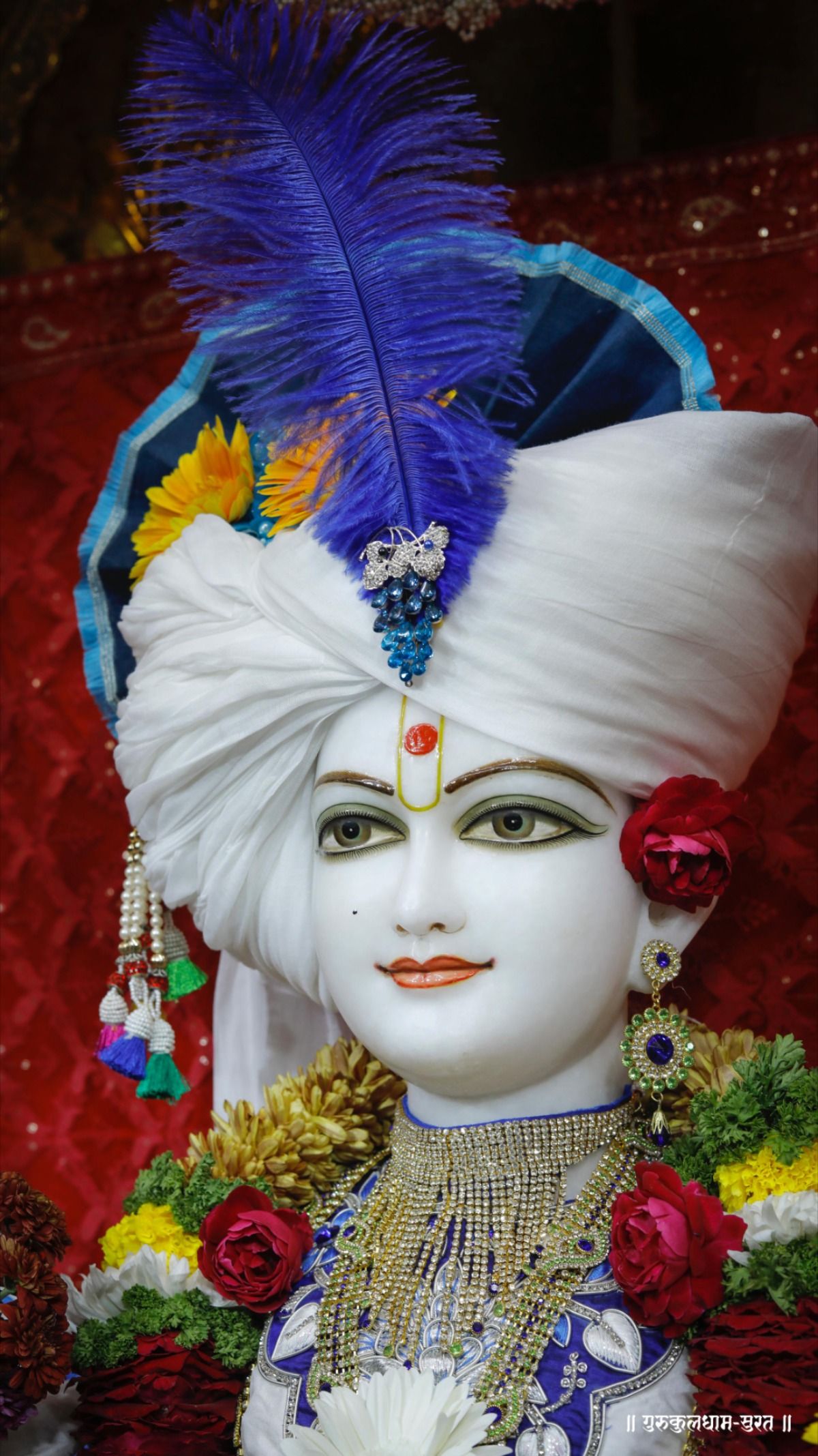 Swaminarayan Bhagwan with peacock feather crown