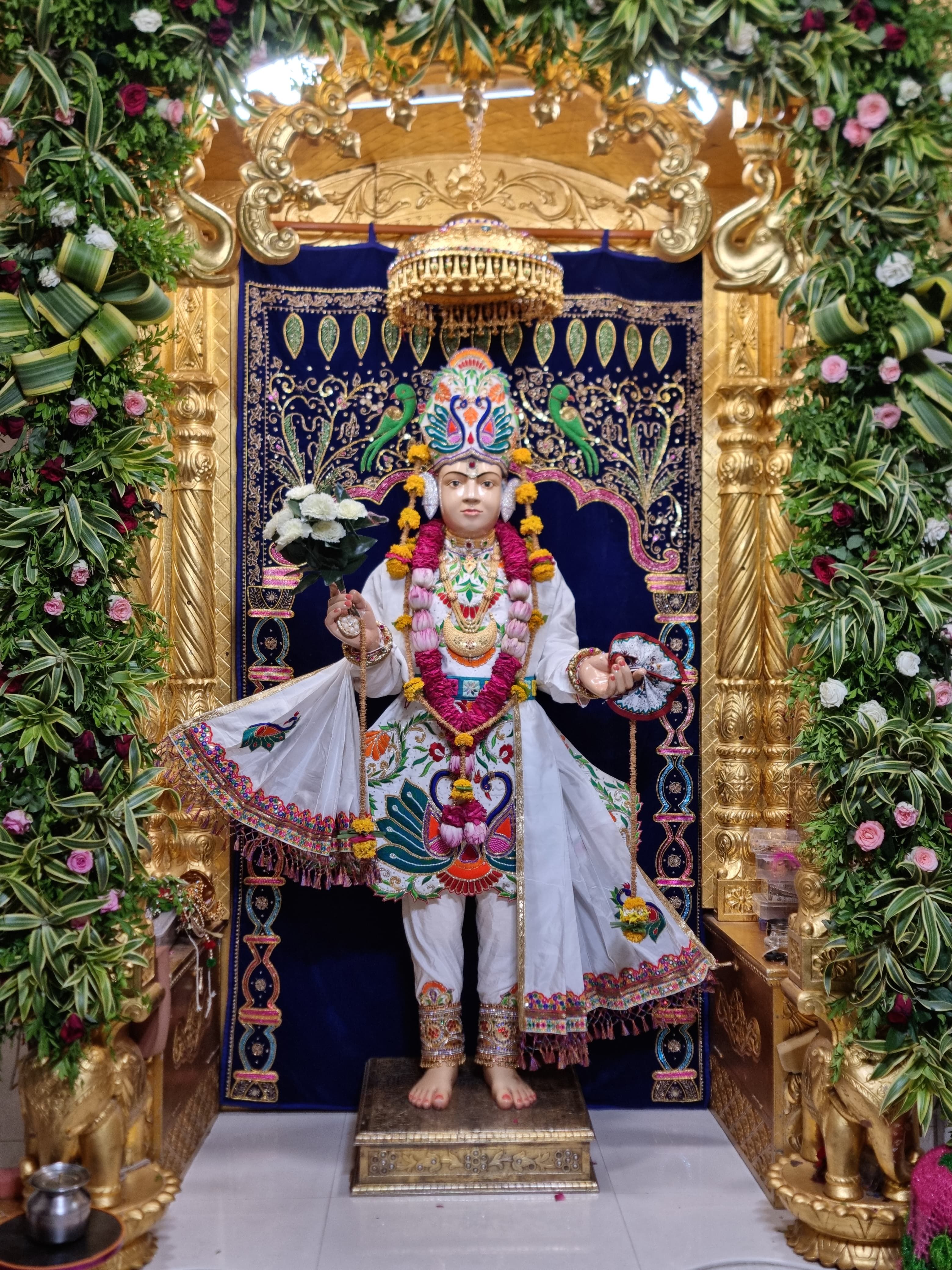 Swaminarayan Bhagwan adorned with floral tribute