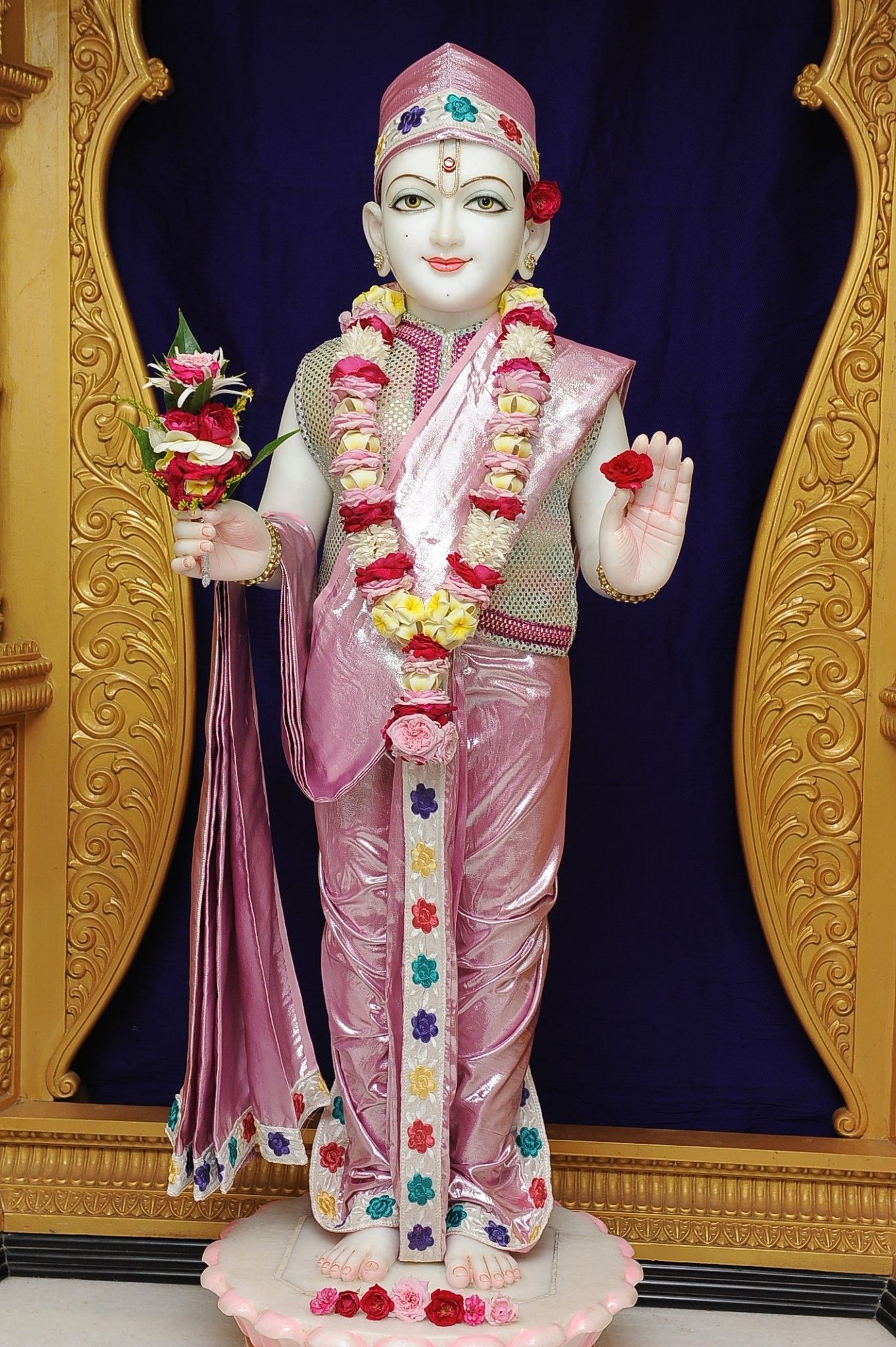 Swaminarayan Bhagwan with floral offerings
