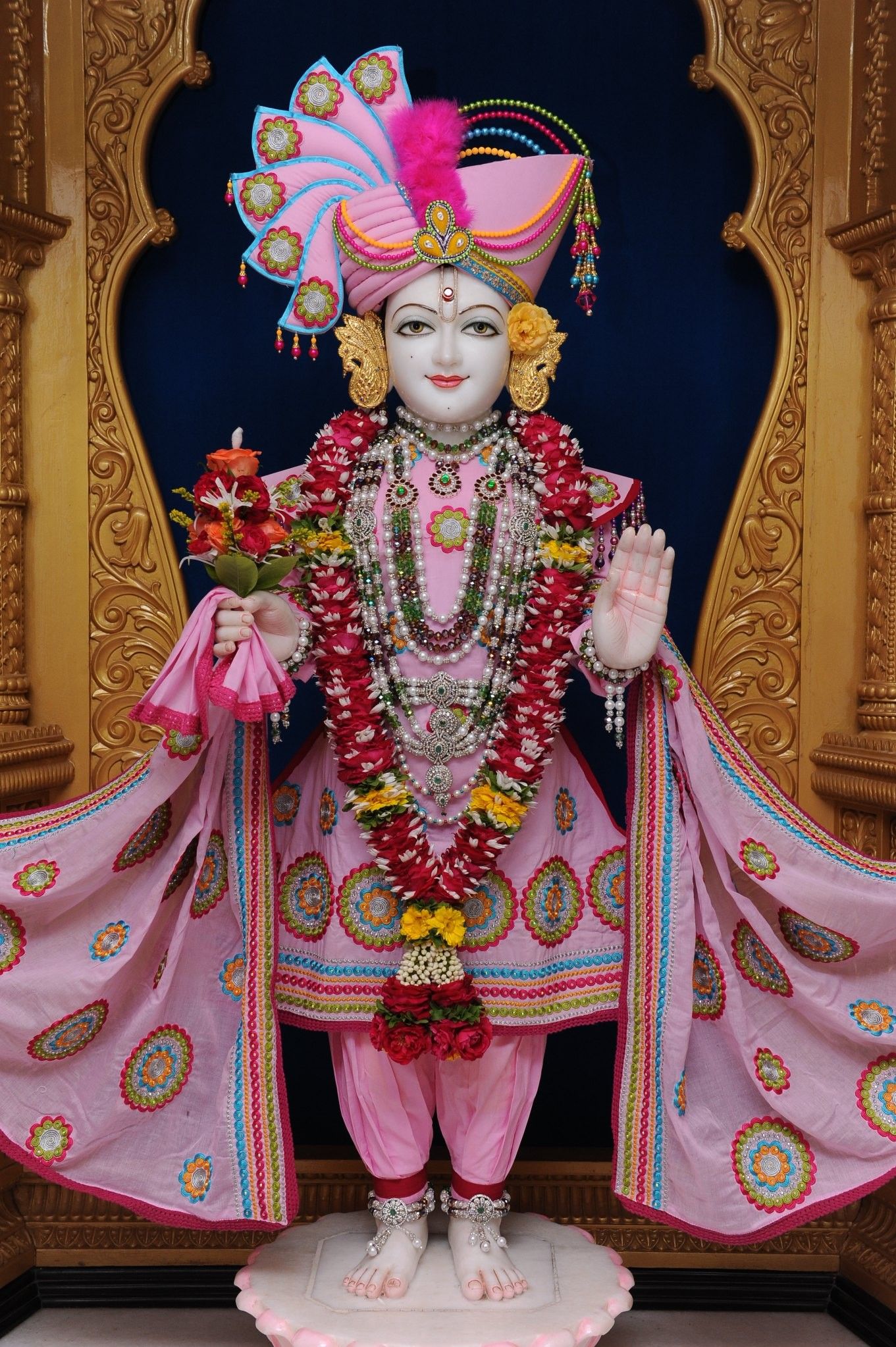 Swaminarayan Bhagwan in pink attire.