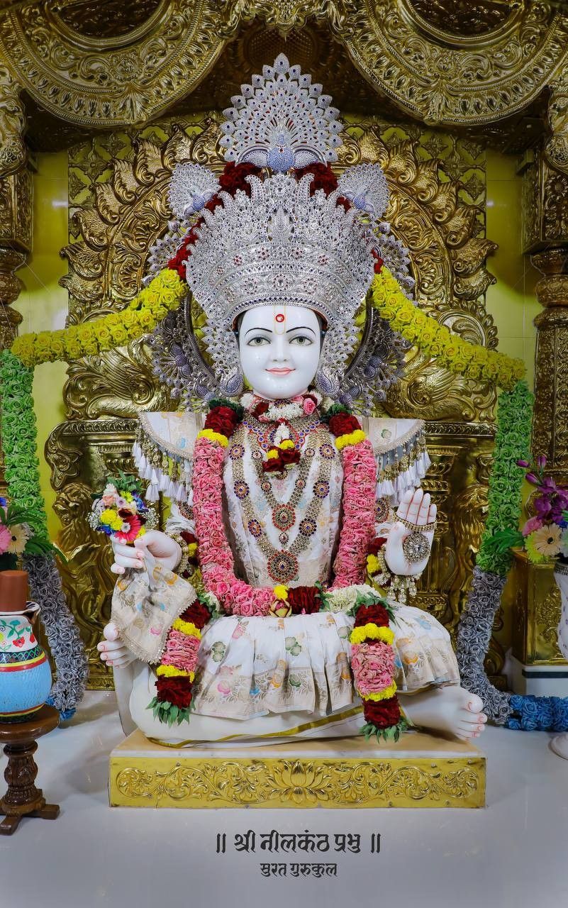 Swaminarayan statue in temple setting
