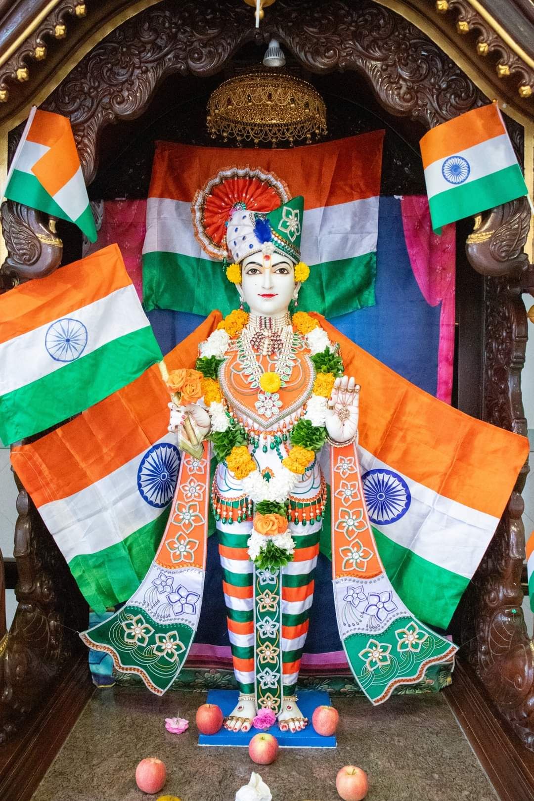 Swaminarayan Maharaj draped in Indian flag