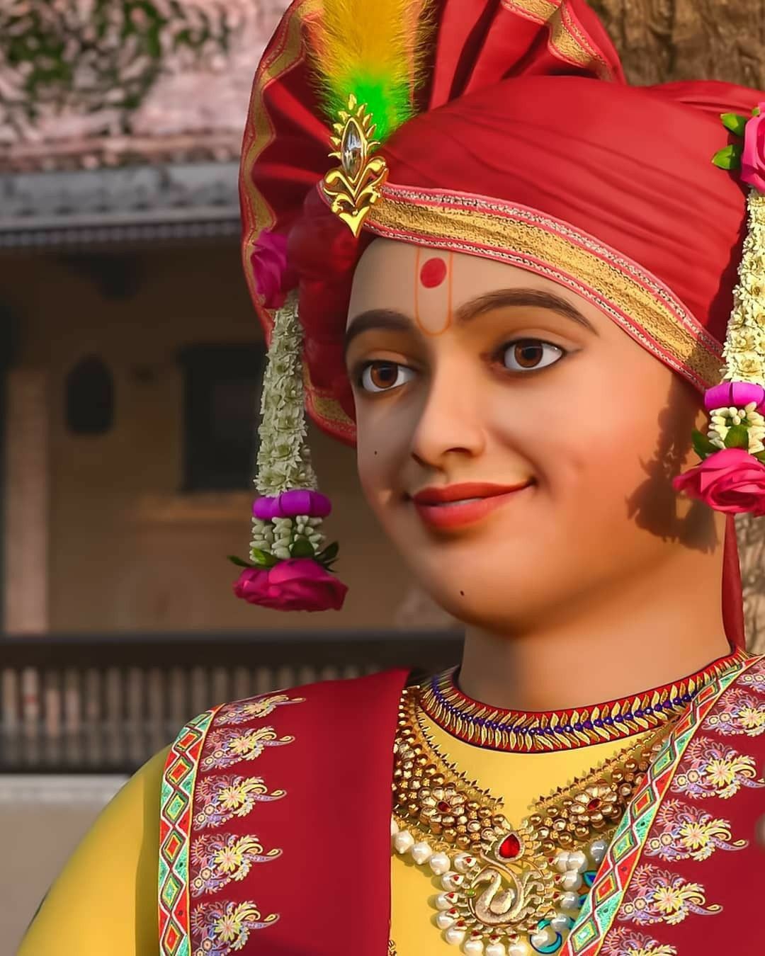 Swaminarayan in ornate traditional dress