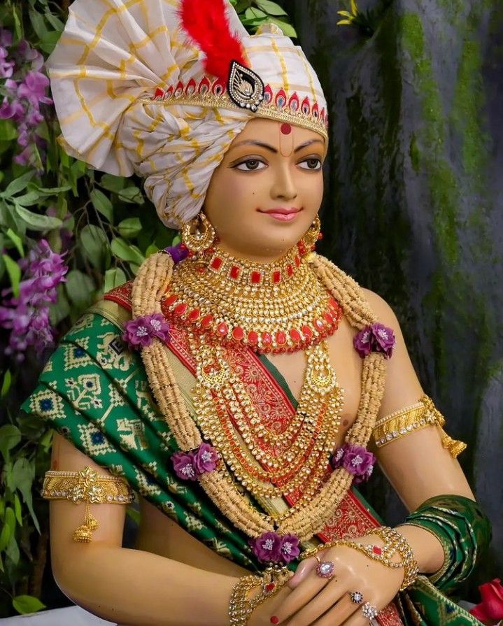 Swaminarayan in golden jewelry and turban