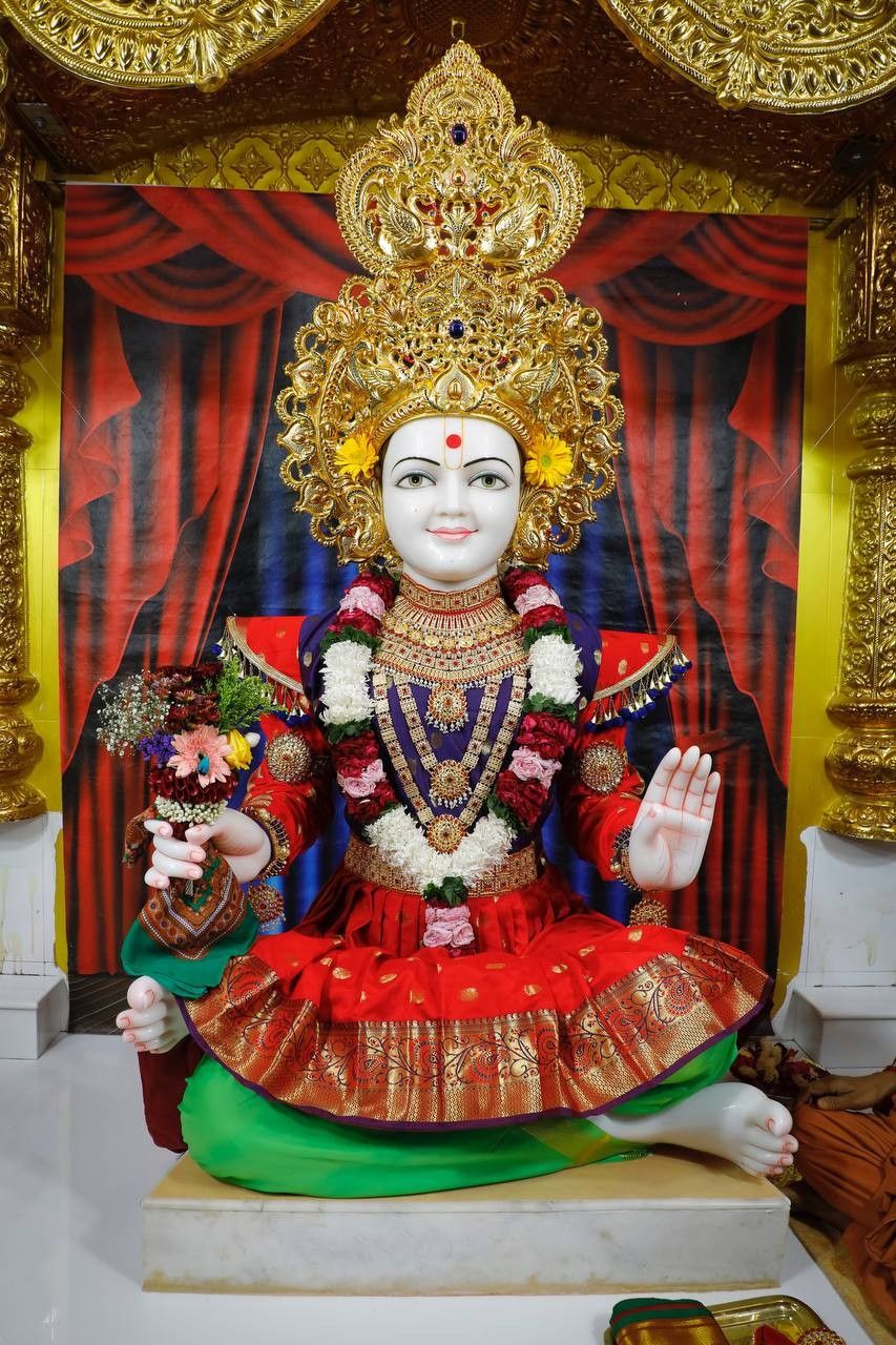 Swaminarayan murti in a temple setting