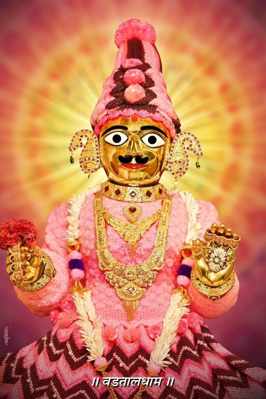 Swaminarayan portrait with gold ornaments