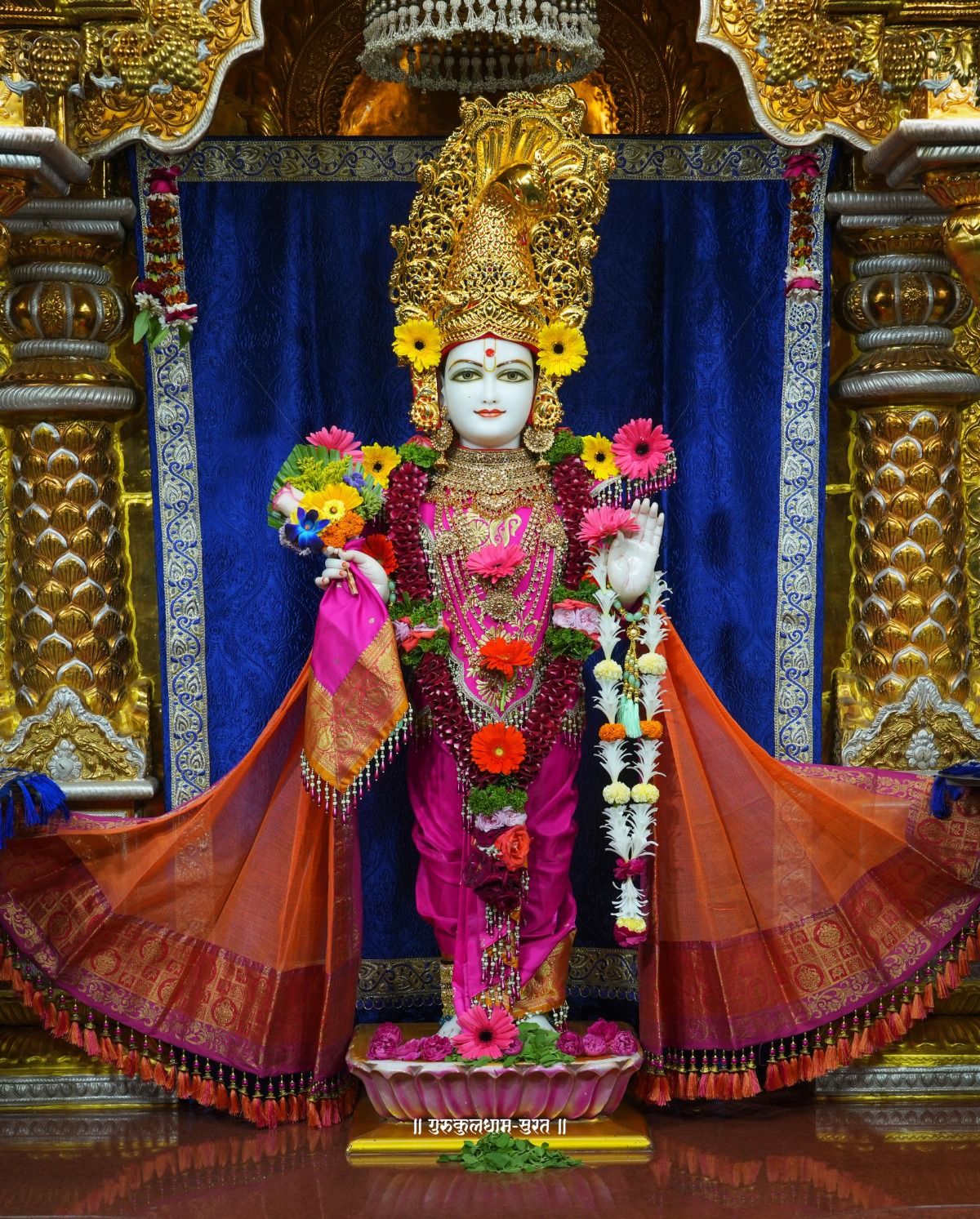 Swaminarayan deity adorned with flowers