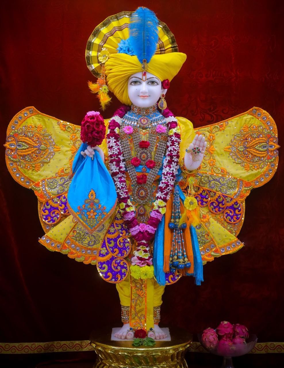 Swaminarayan in ornate ceremonial attire
