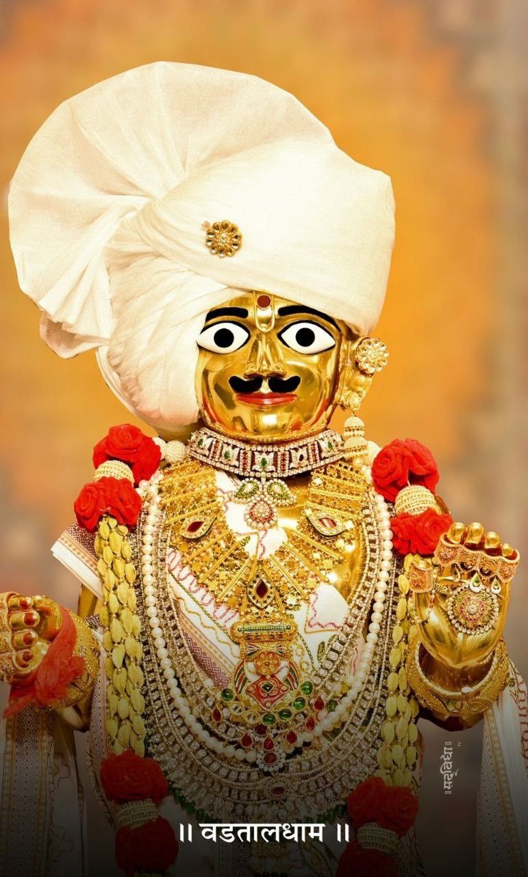 Swaminarayan with golden adornments