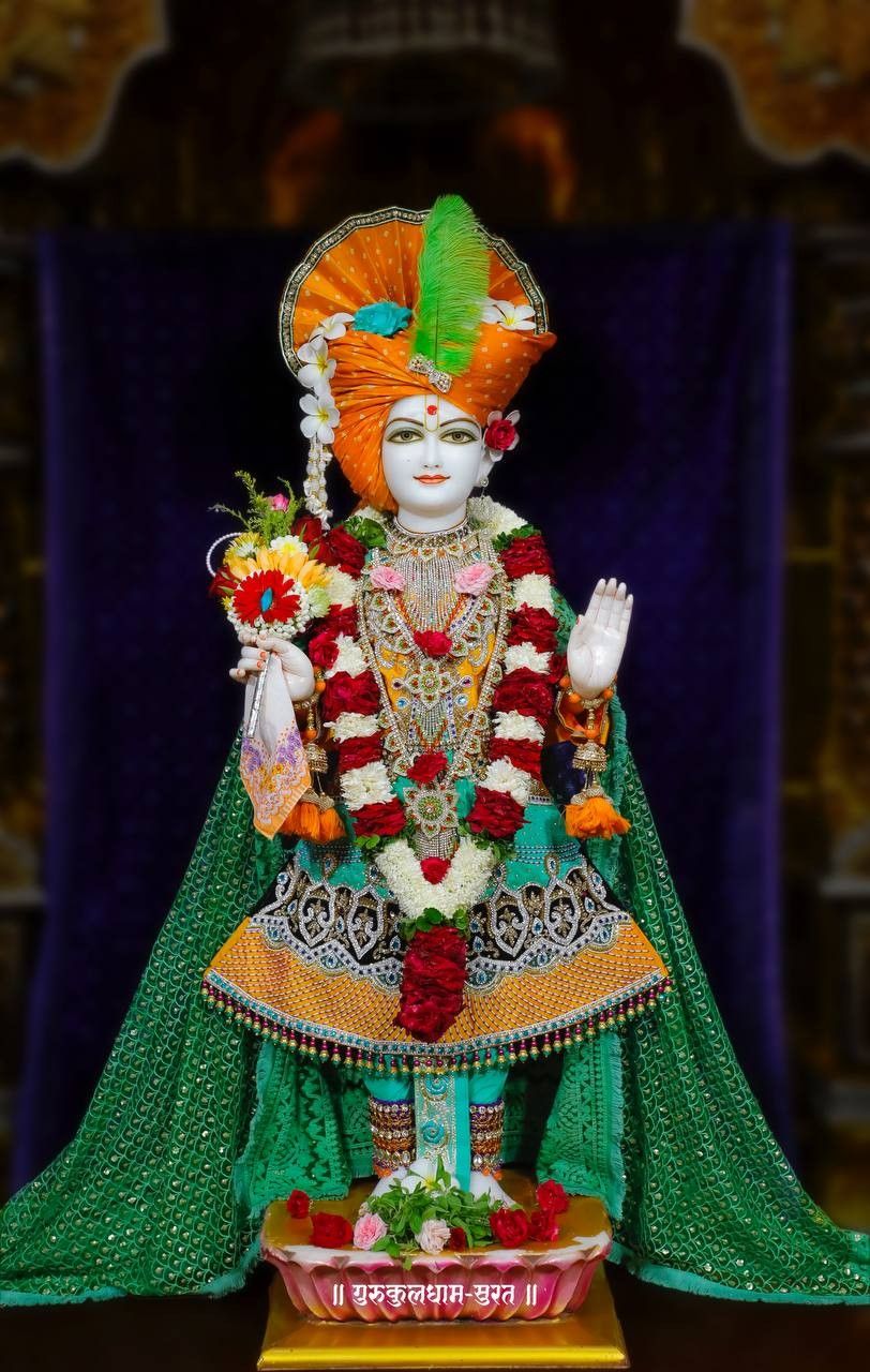 Swaminarayan deity in ornate temple setting