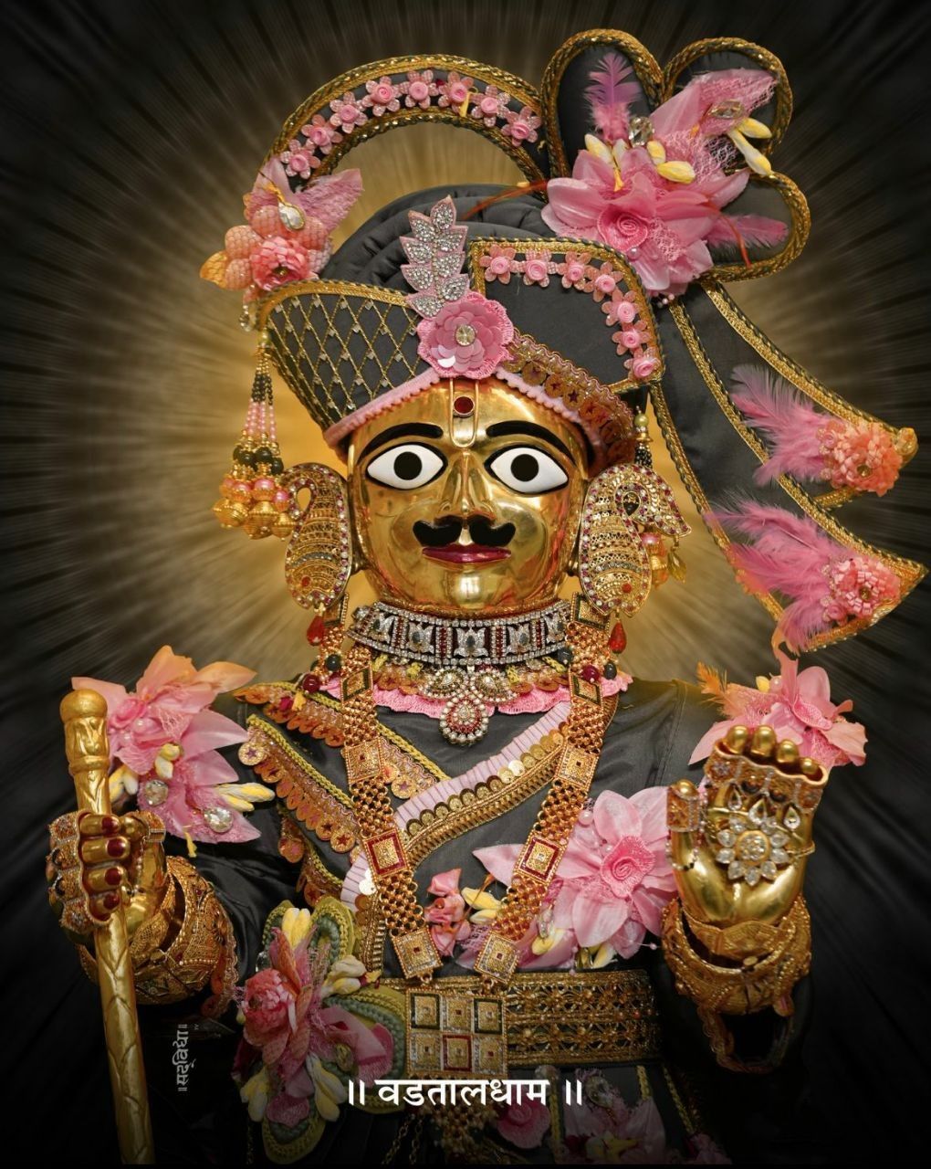 Swaminarayan Bhagwan with floral decorations