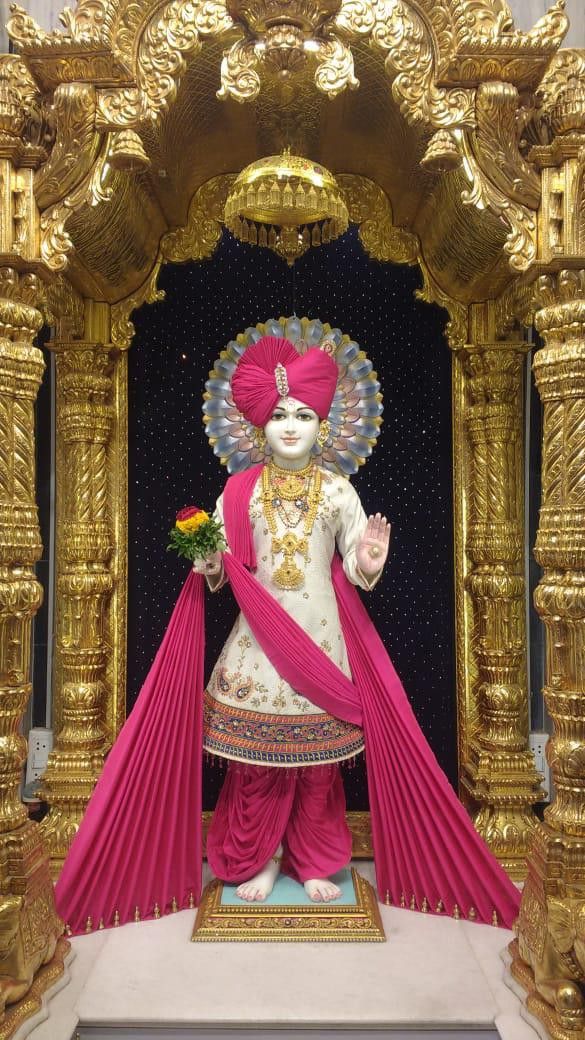 Swaminarayan Bhagwan in ornate temple setting
