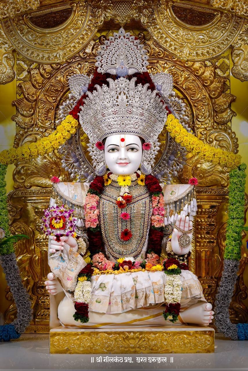 Swaminarayan statue adorned with gold