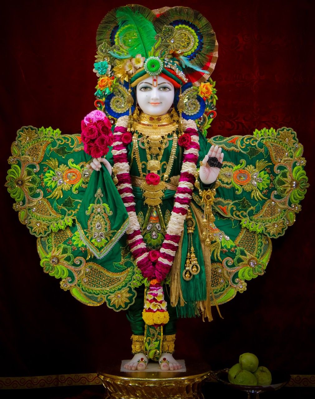 Swaminarayan Bhagwan with floral decorations