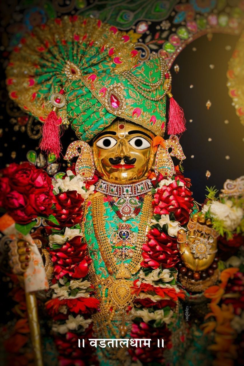 Divine Swaminarayan portrait with flowers