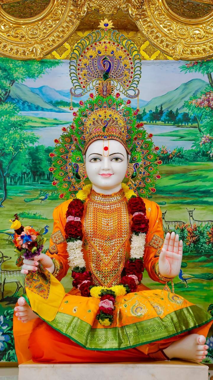 Swaminarayan with peacock feather crown