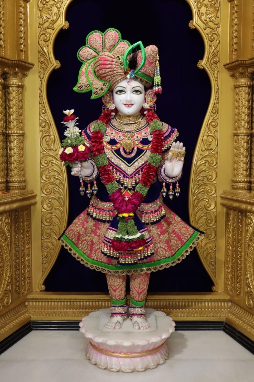 Swaminarayan deity adorned with flowers