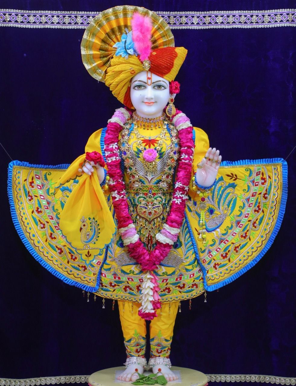 Swaminarayan deity in golden attire