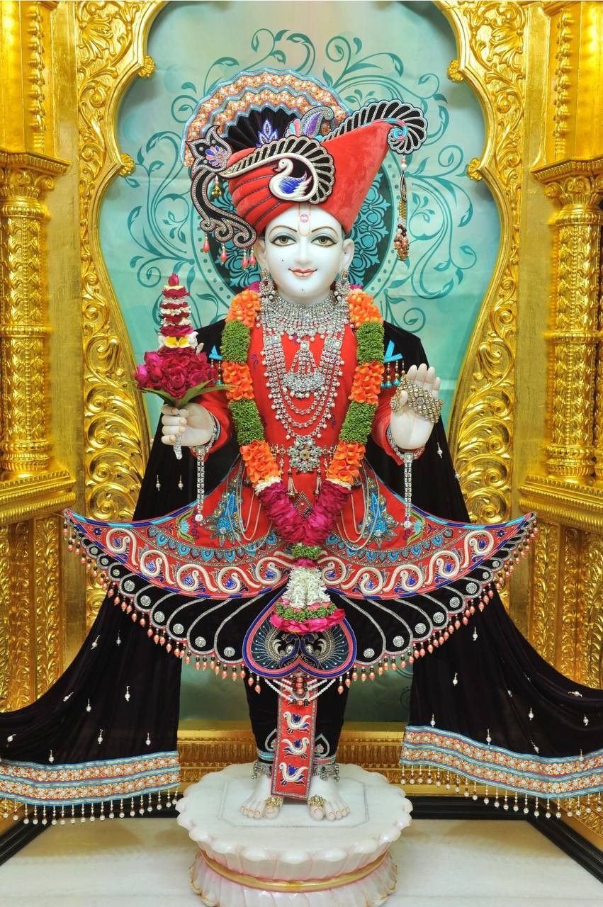 Swaminarayan Bhagwan in ornate temple setting