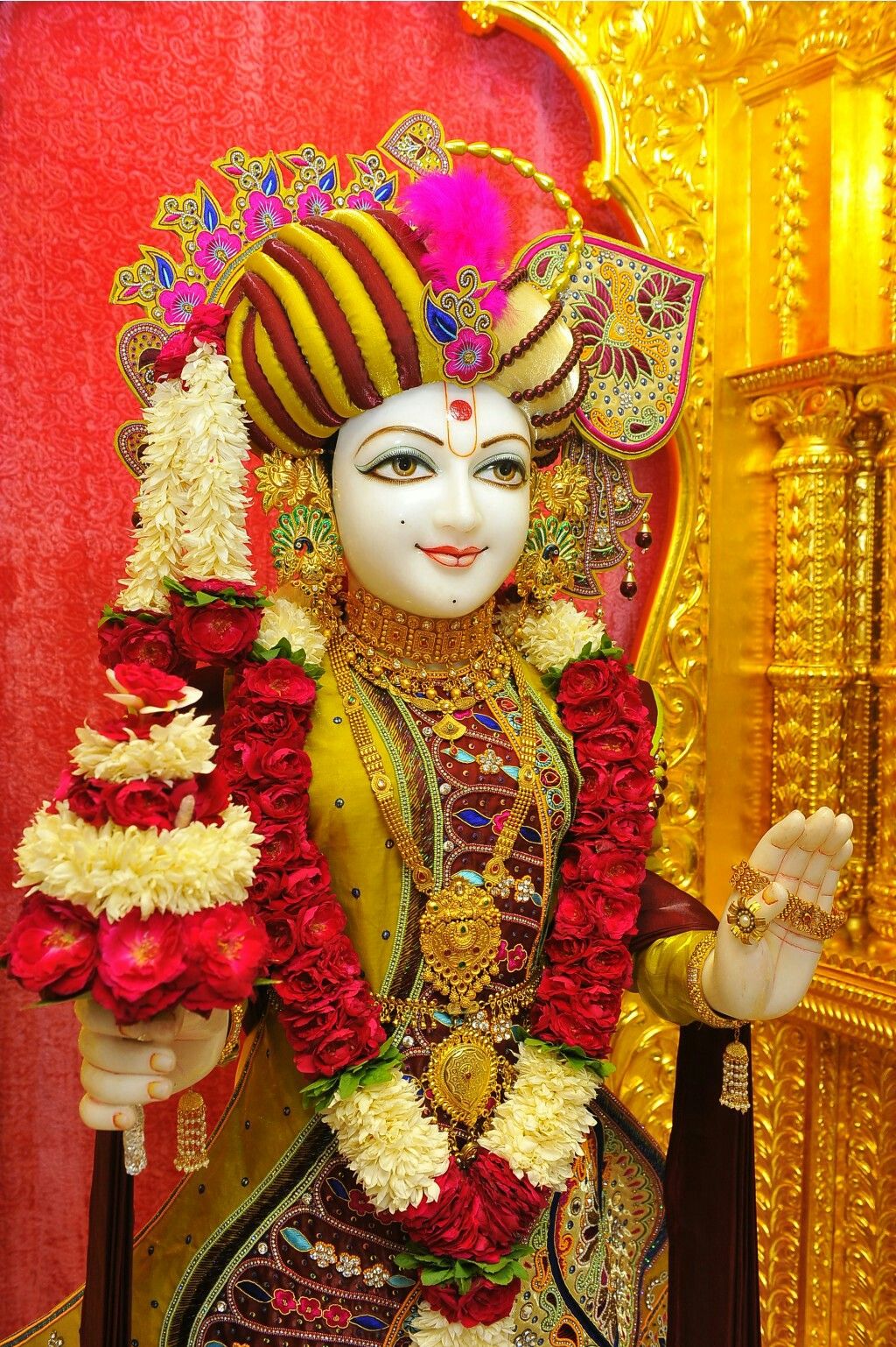 Serene Swaminarayan with floral garland