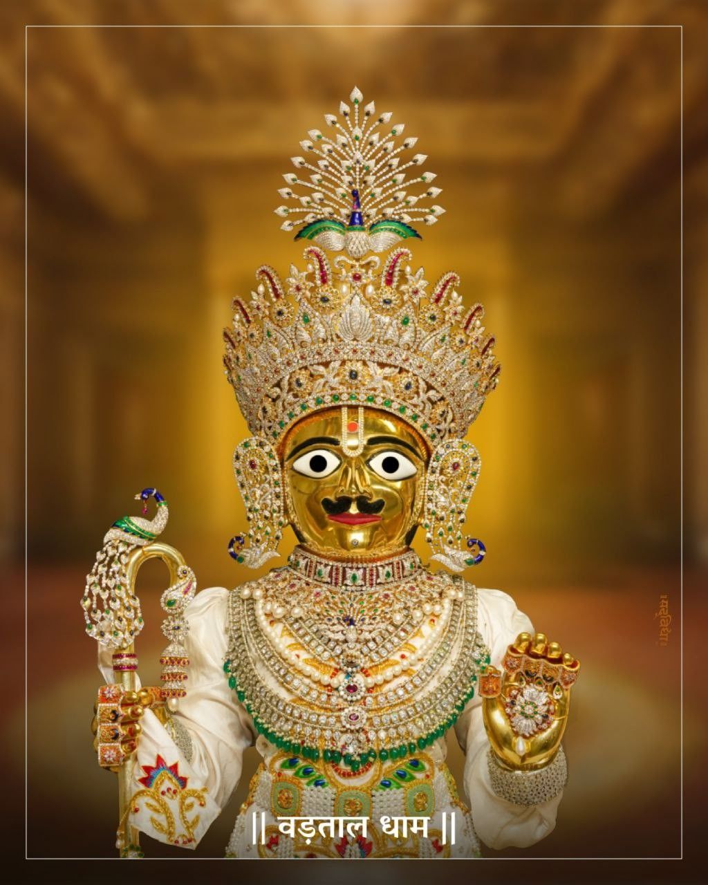 Swaminarayan Bhagwan with ornate crown.