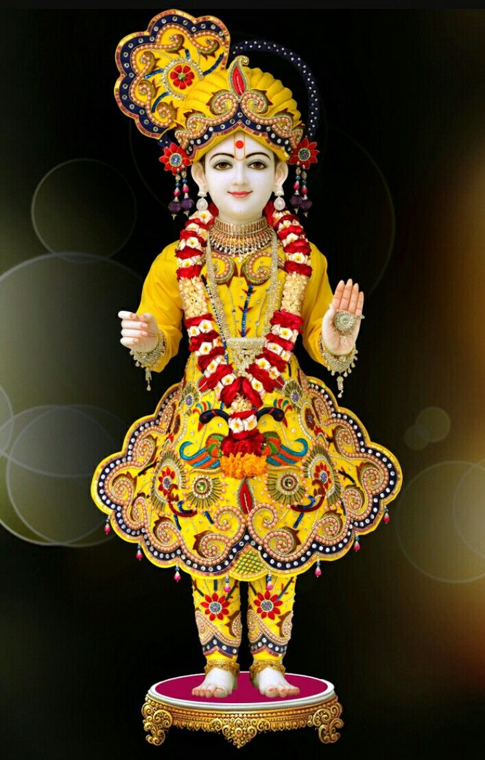 Swaminarayan Bhagwan in yellow attire