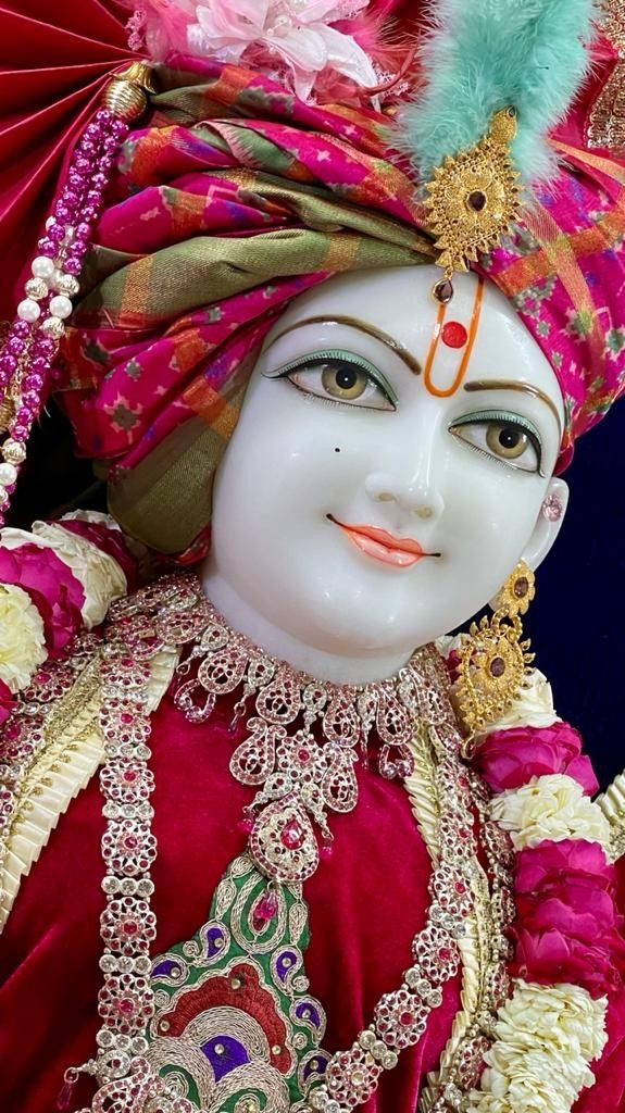 Swaminarayan idol with floral ornaments