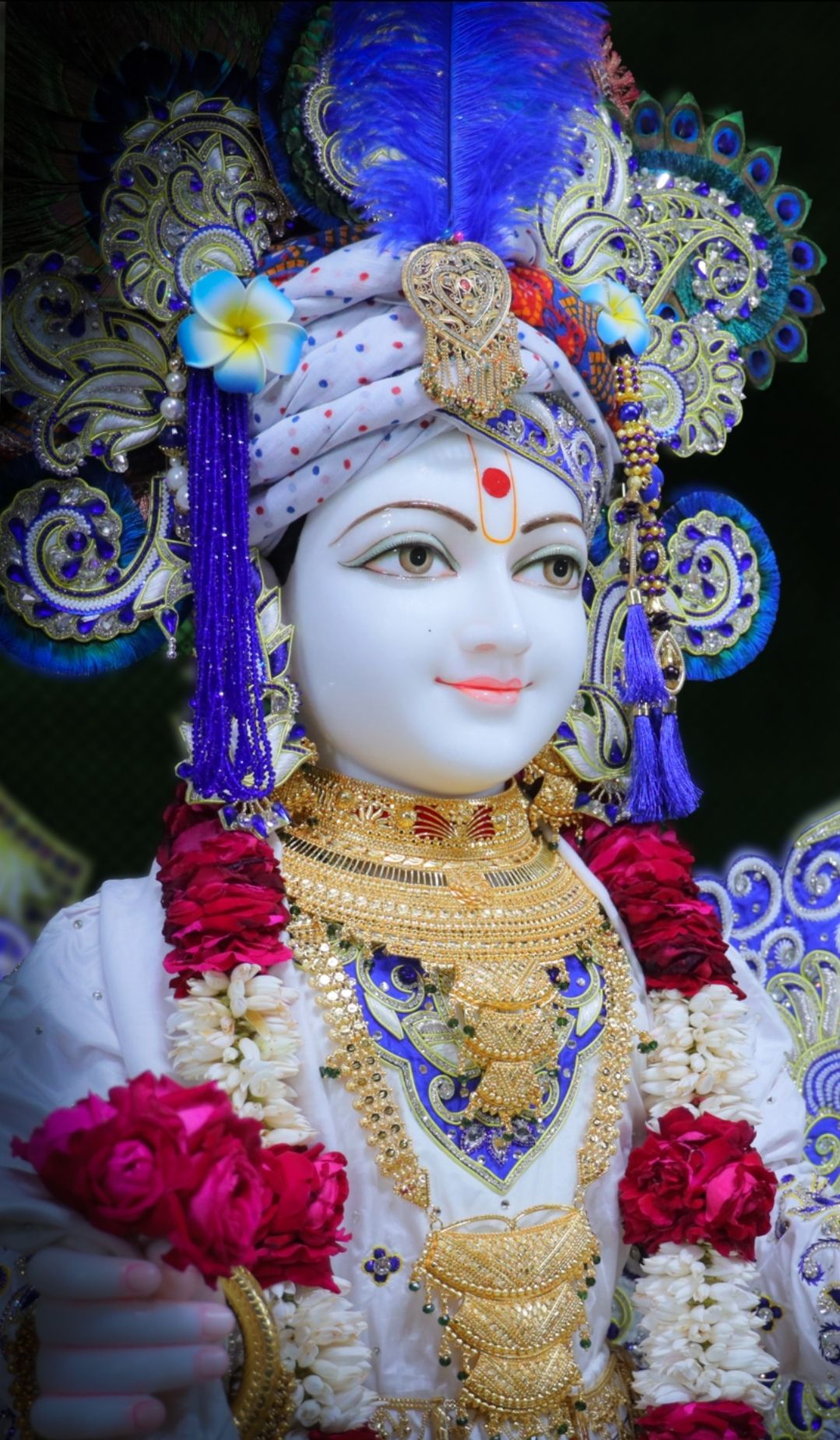 Swaminarayan with floral decorations