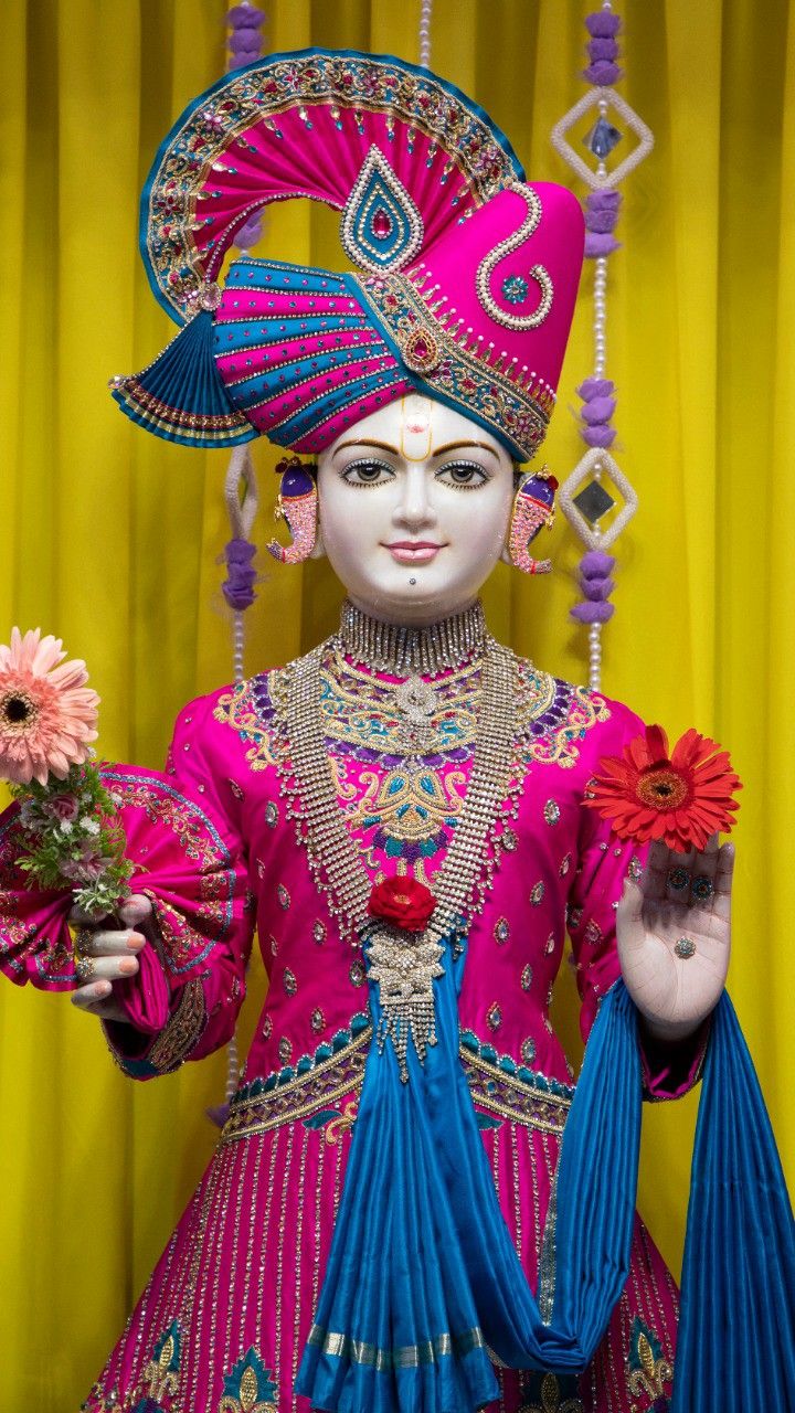 Swaminarayan with flowers, divine portrait.