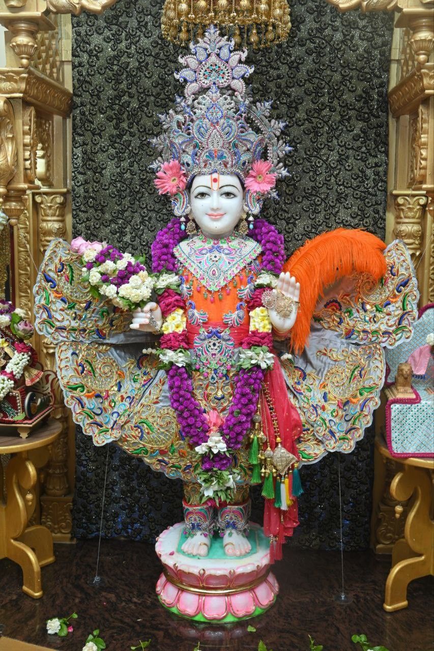 Swaminarayan Bhagwan with floral decorations