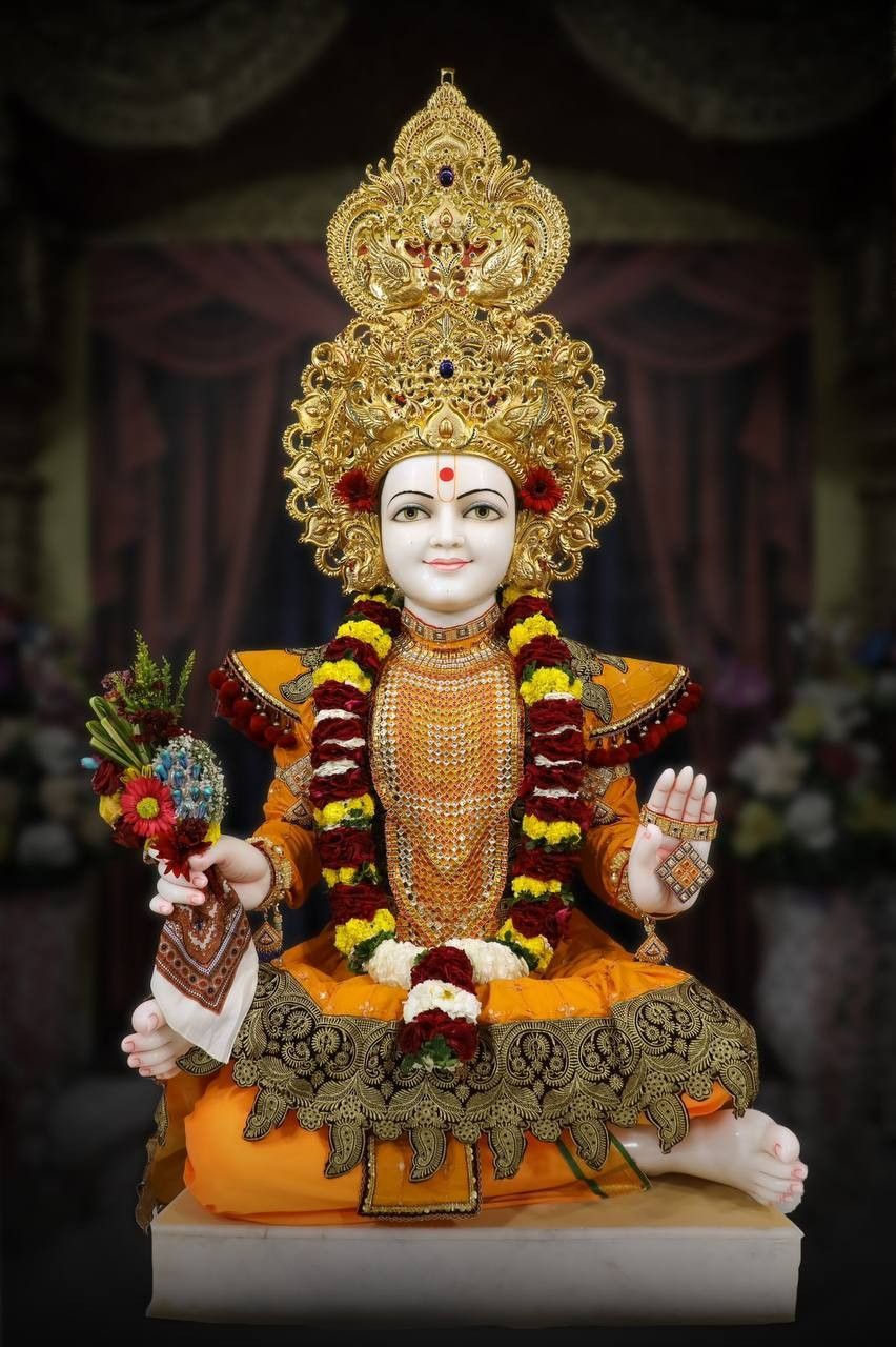 Swaminarayan deity serene golden portrait