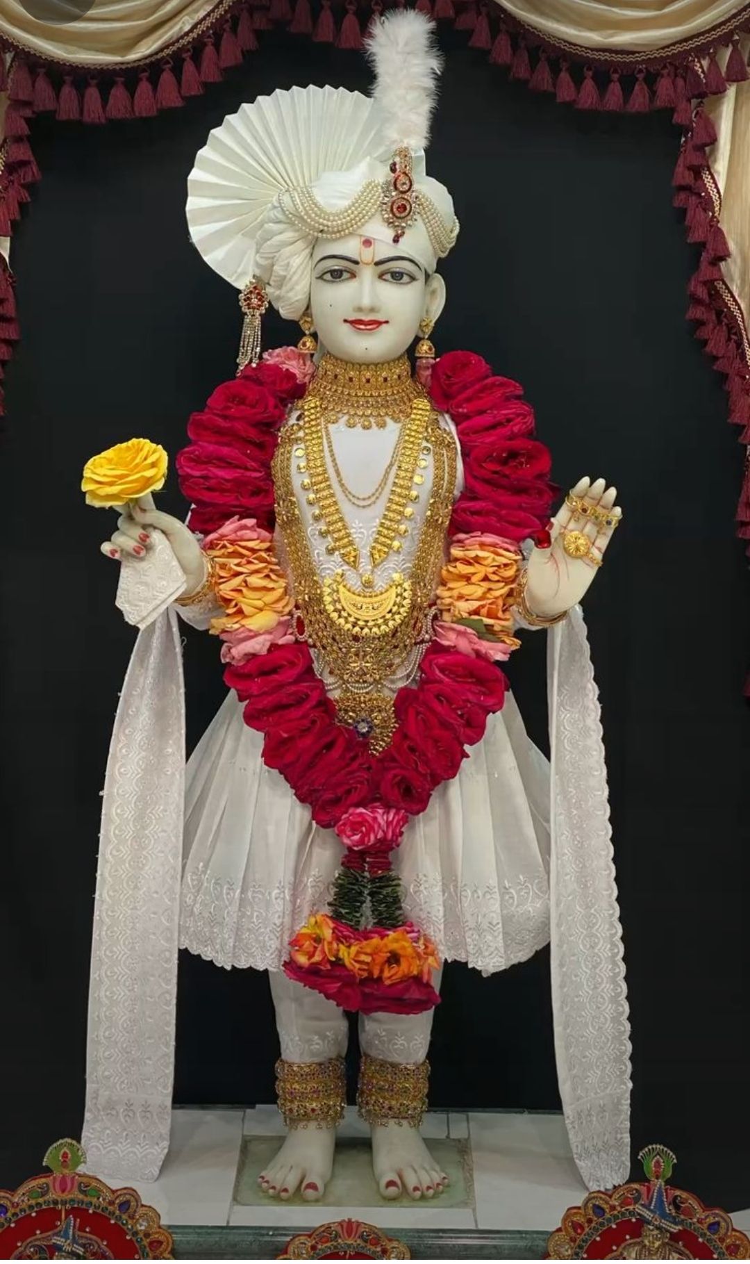 Swaminarayan Bhagwan with floral garland