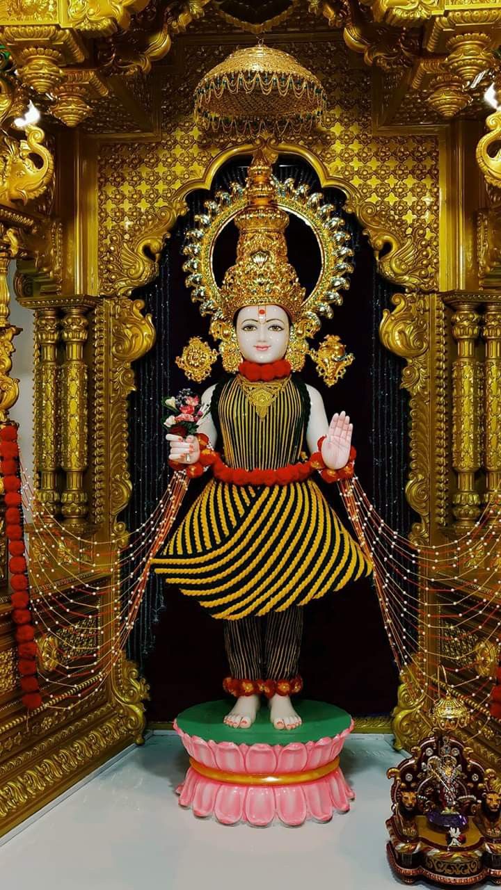 Swaminarayan idol in golden temple setting