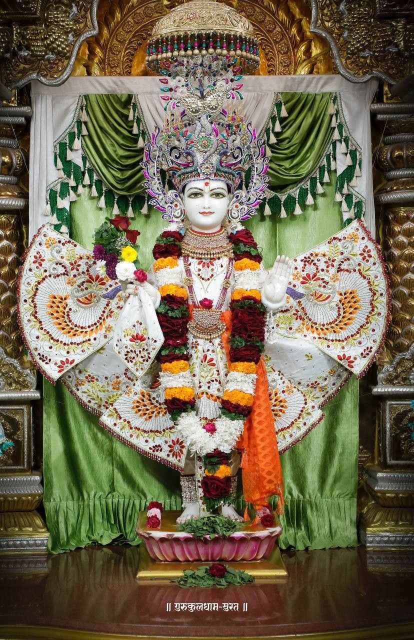 Swaminarayan deity in ornate temple setting
