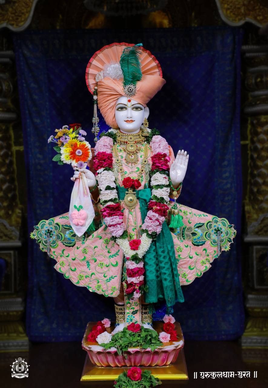 Swaminarayan deity with floral offerings