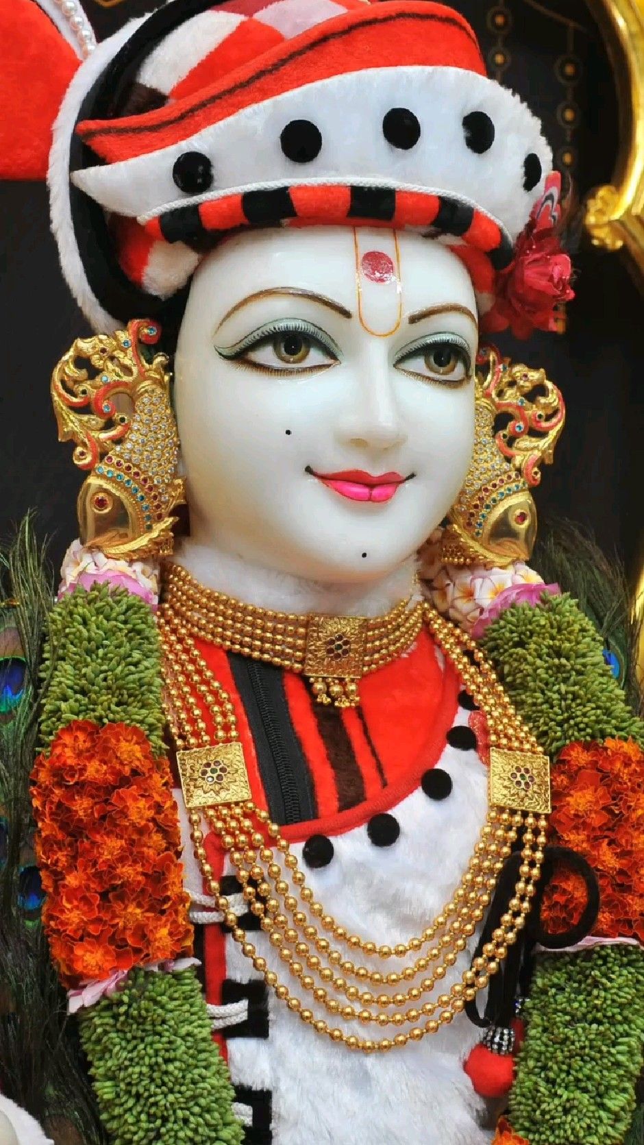 Swaminarayan with golden jewelry portrait